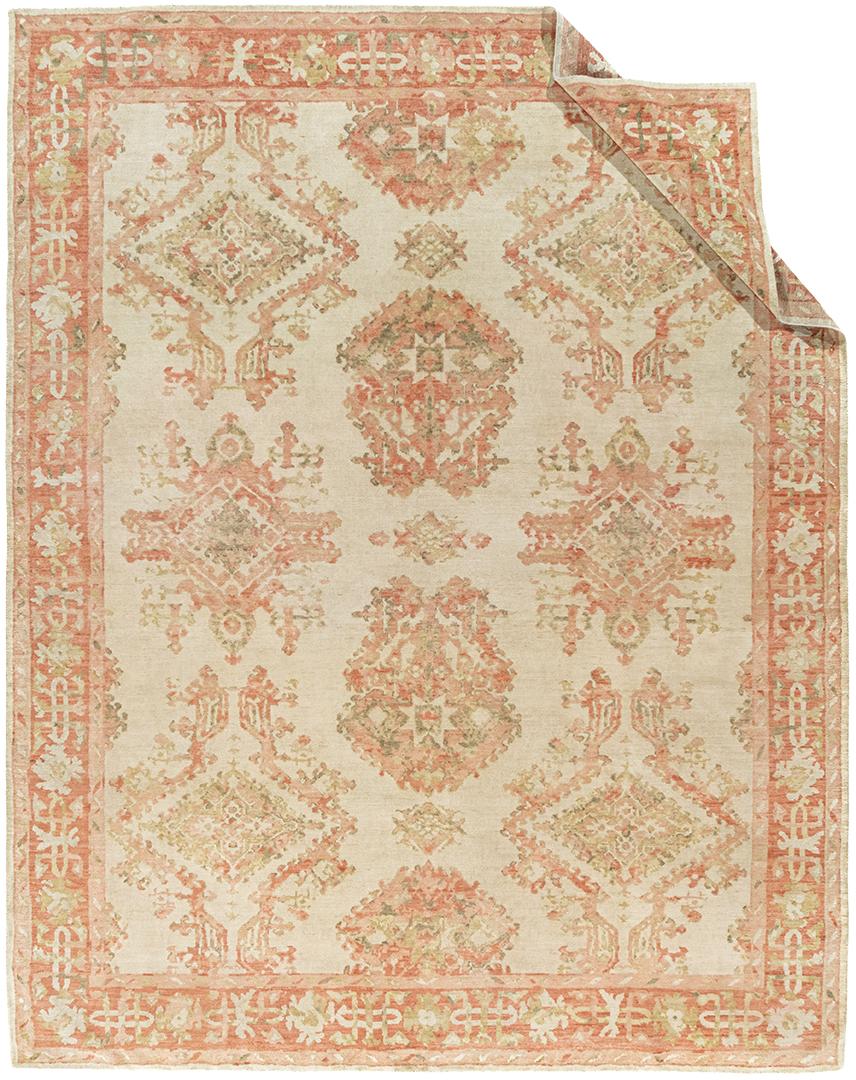 Oushak style Handwoven Carpet rug 9' x 11'5. Handwoven using the finest of materials this is a Classic recreation of an Oushak rug in soft colors.