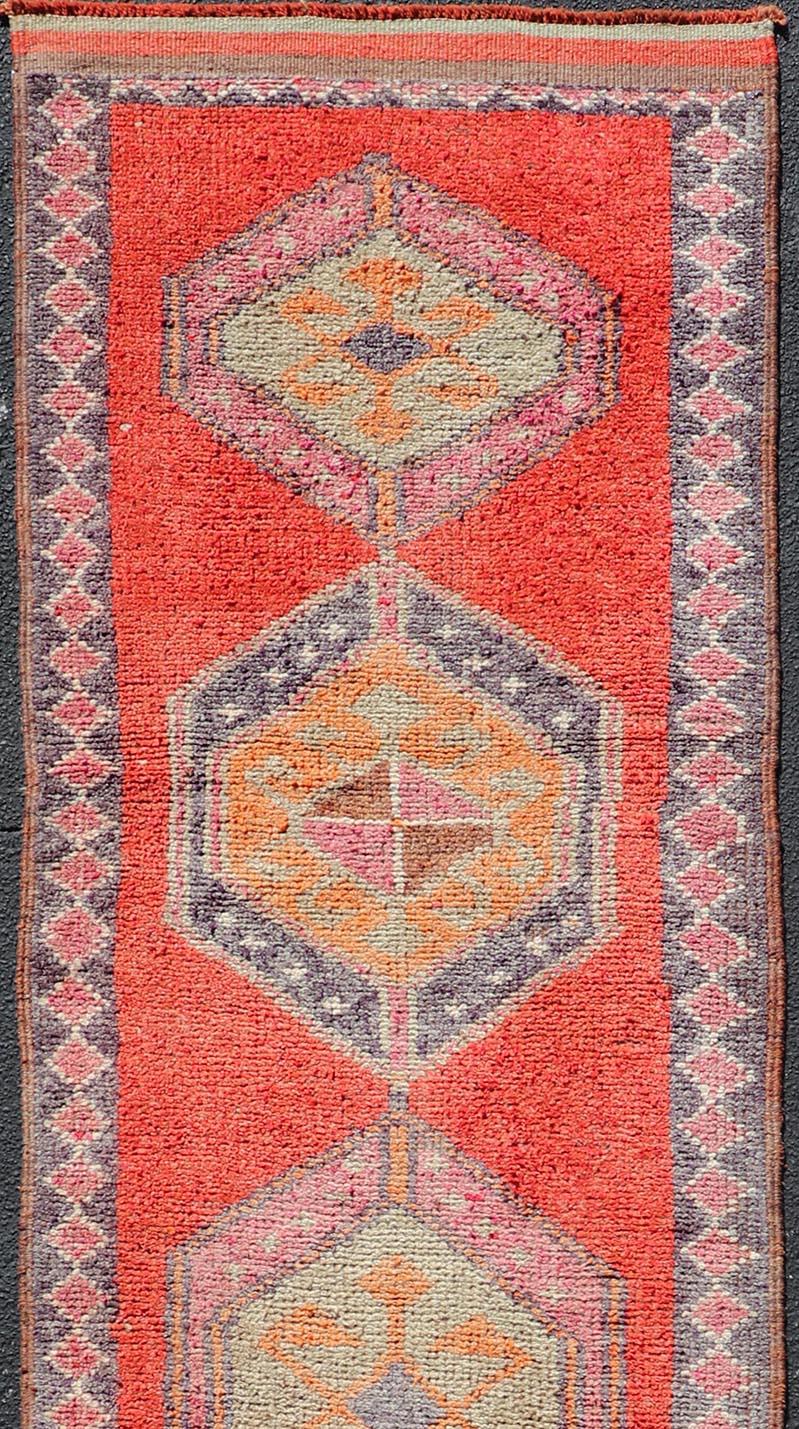 Hand-Knotted Oushak Vintage Turkish Runner with Geometric Medallion Design with Orangey-Red For Sale