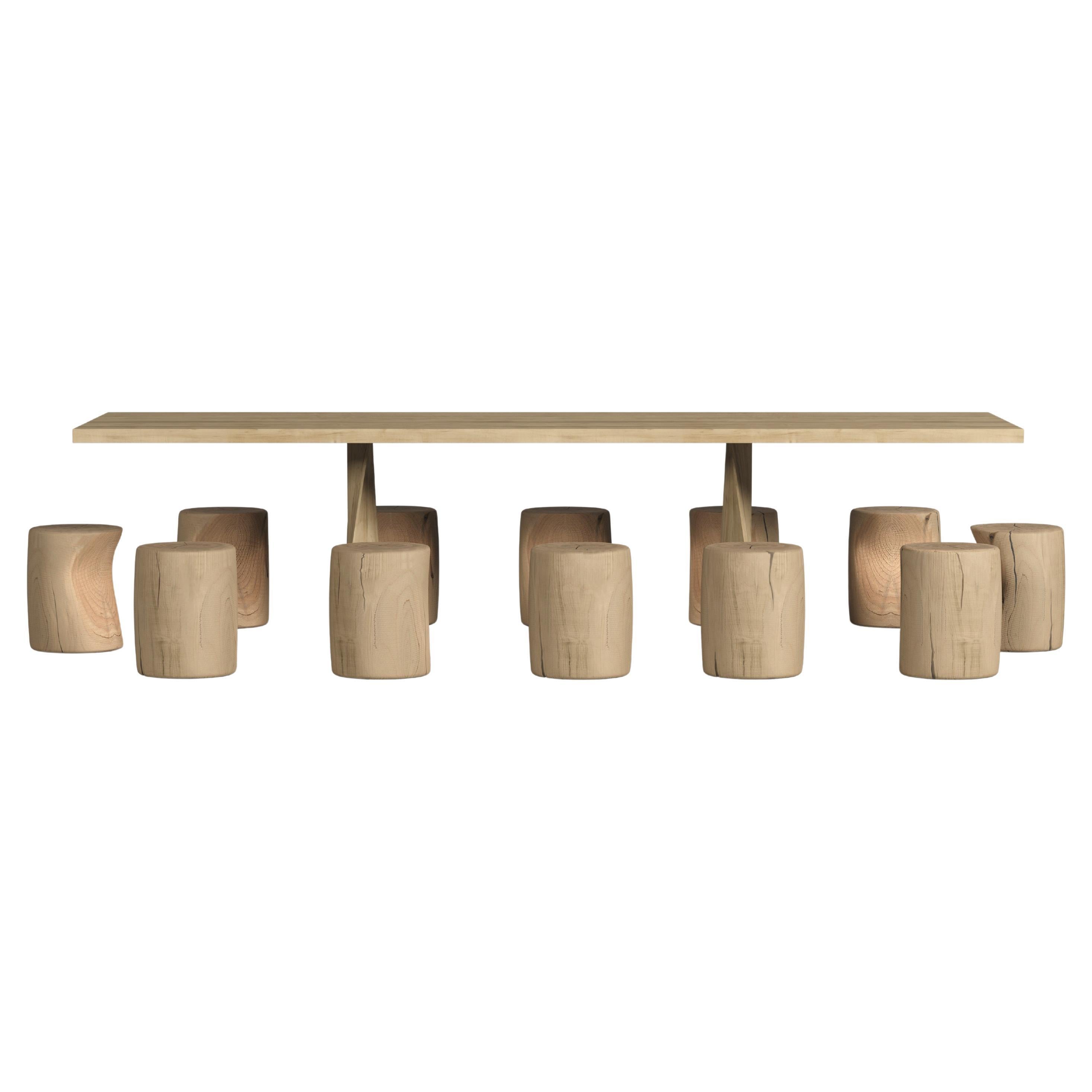 This outdoor collection, entirely crafted in Italy, features a dining table and stools made from cedar wood, all designed for outdoor use.

This outdoor table is crafted from beautifully scented Lebanon cedar wood, filling the air with its natural