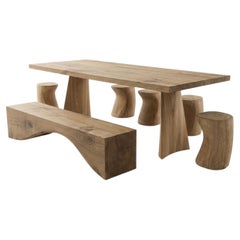 Monolithic Outdoor Solid Cedar Dining Table with Carved Bench and Five Stools