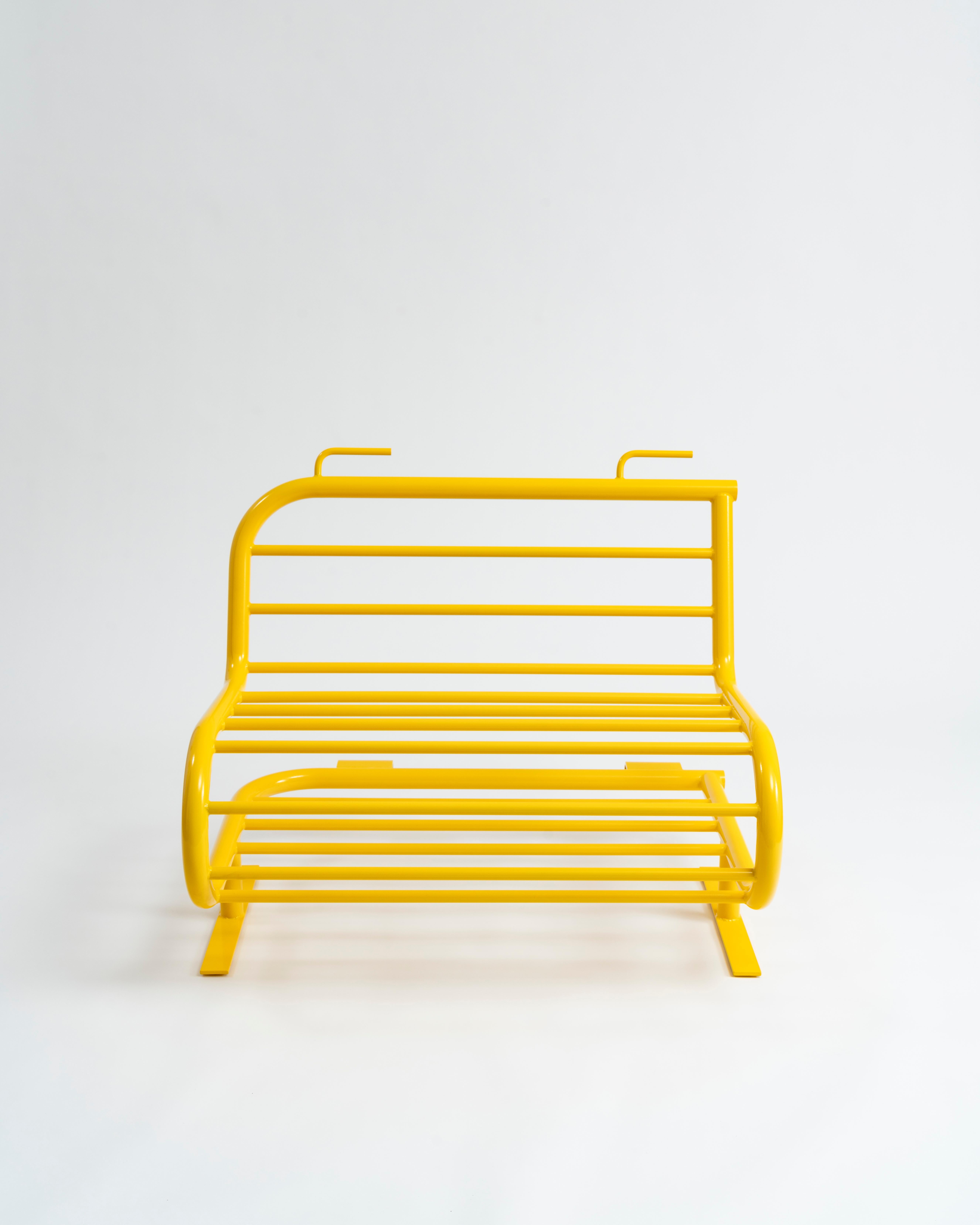 This vibrant sunshine yellow powder-coated tubular steel bench by New York-based design practice JUMBO NYC is an exceptionally durable two-seater bench made in the form of a metal fence panel, or police barricade, that has been contorted into a the