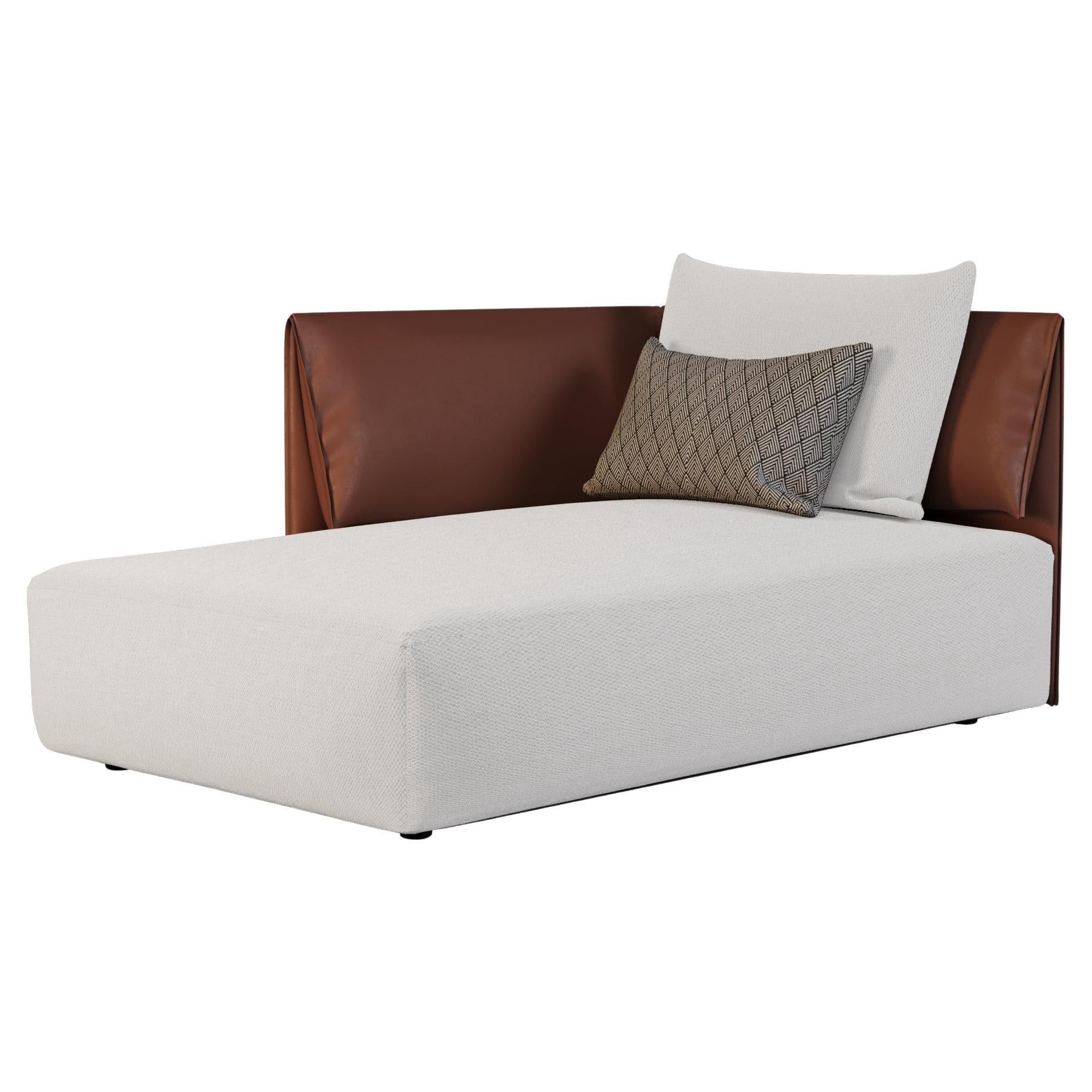 Chaise longue avec détails en cuir et coussins à motifs pour l'extérieur