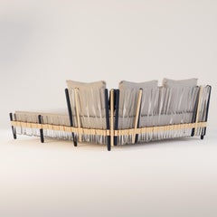 Stylish Houdini Outdoor Daybed with Navy Blue and Gold Accents