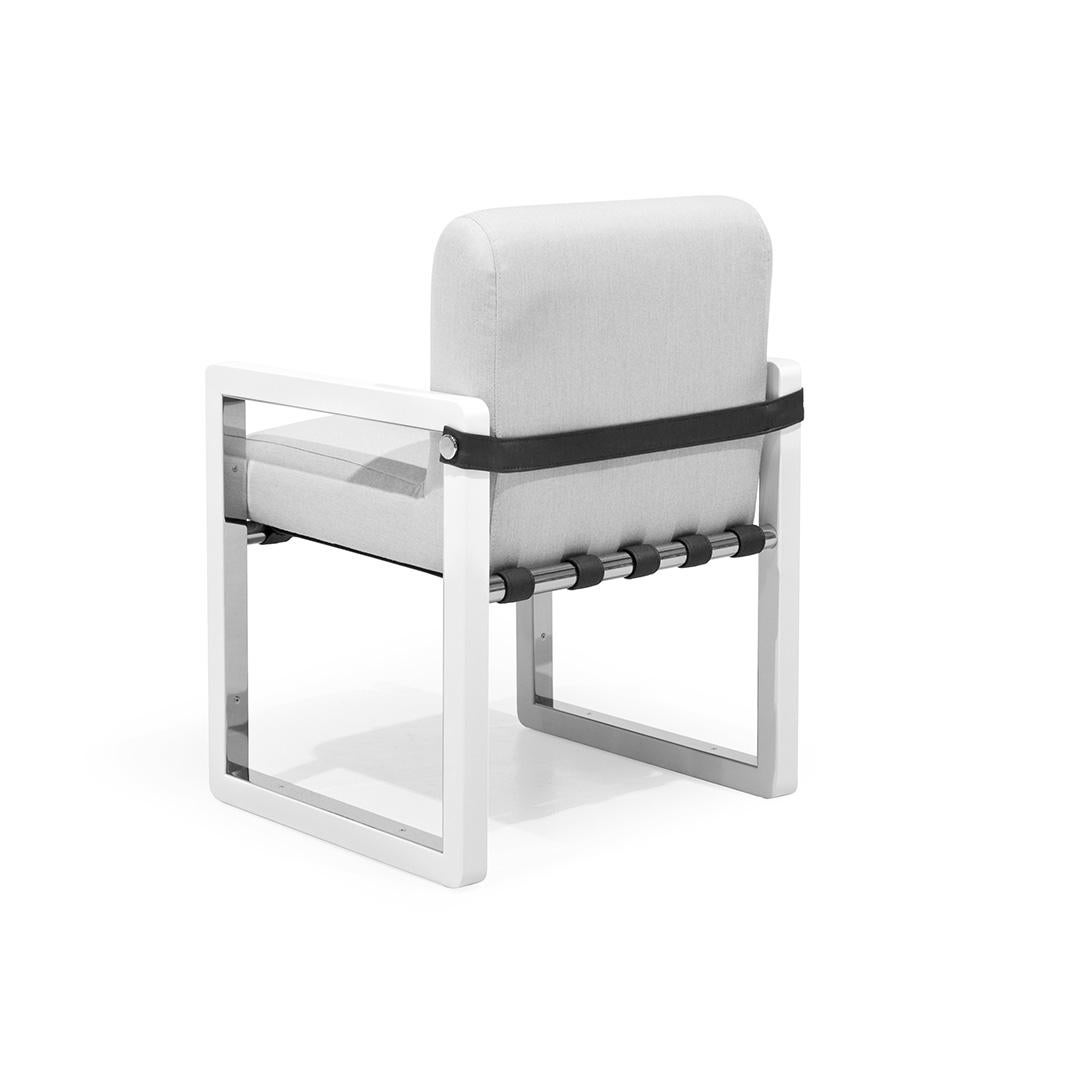 Saccu - Outdoor dining chair.

Modern outdoor armchair made with structure: white matte powder coated aluminum and stainless steel, details: nickel-plated, upholstery: acrylic fabric, straps: outdoor synthetic leather

With Saccu Collection, MYFACE
