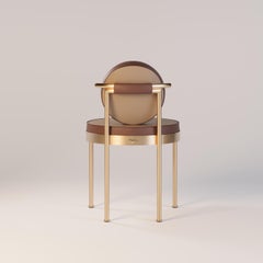 Designer Outdoor Chair Highlighted by a Gold Frame