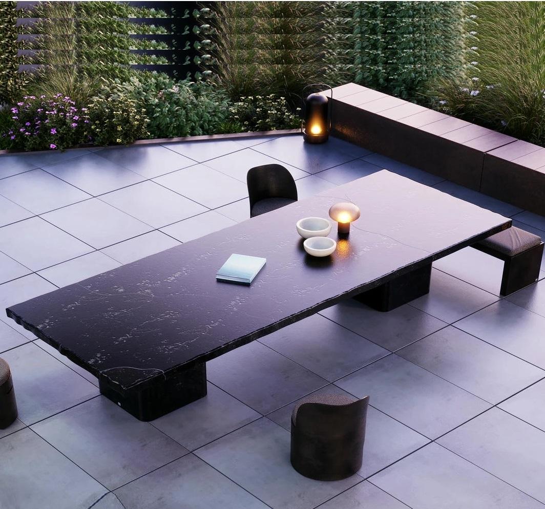 This outdoor dining table is a striking blend of modern design and robust form. Its straight lines, raw look, and slate-textured finish in dark tones create a sophisticated centerpiece for any outdoor space.
Dimensions: 130