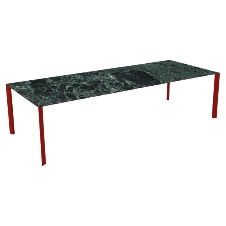 Fixed dining table with four-legs base. Legs and structure lacquered in sage green. Ceramic table top in Green Tinos Finish.
Other version available with metal frame and painted glass top. 
Dimensions:
118.12