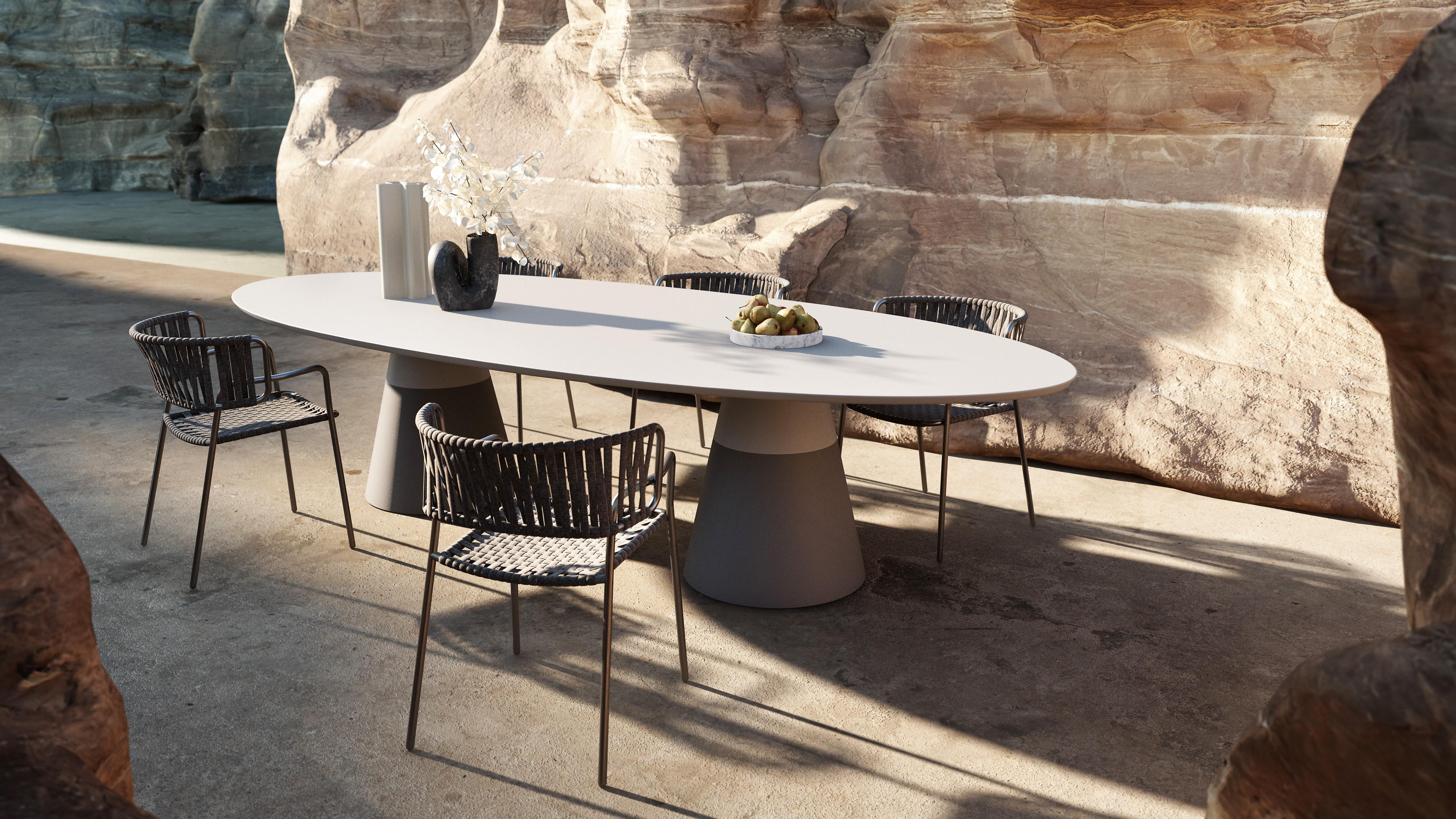 Mesa de Comedor Elíptica de Exterior con Efecto Travertino Cepillado Resina en venta