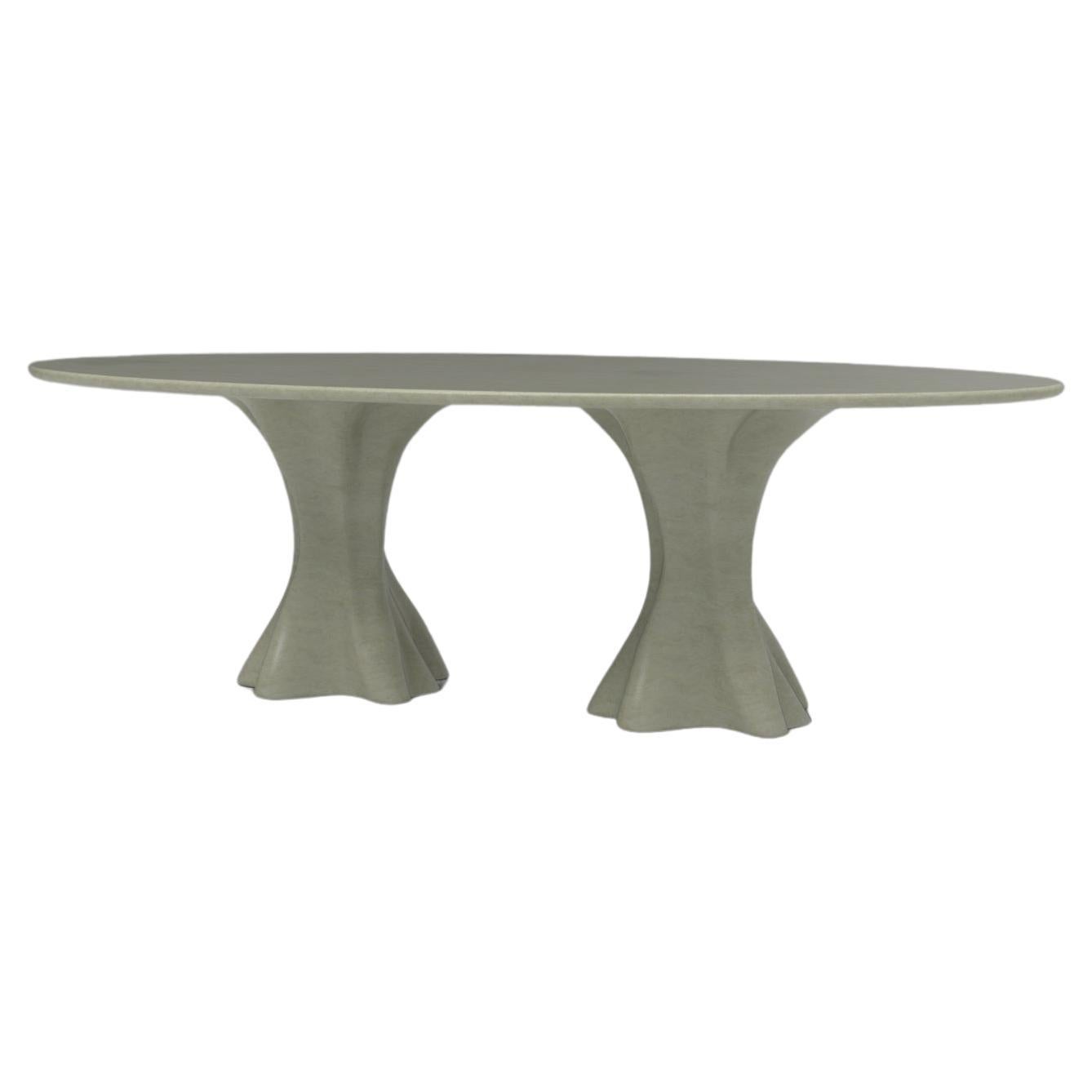 The dining table Calypso with 2 bases proves that the simplest and most genuine forms, often culminate in the most interesting pieces. Suitable for outdoor.
Top: Resin reinforced with fiberglass in natural aged fiberglass finish
Base: Resin