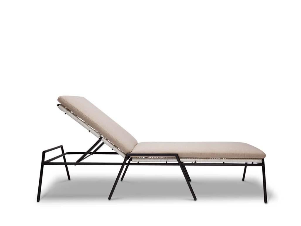 The Hinterland Chaise has a powder coated solid steel frame that is fully wrapped in rope.  The back adjusts from upright to flat and the frame has upholstered removable cushions 

The Lawson-Fenning Collection is designed and handmade in Los