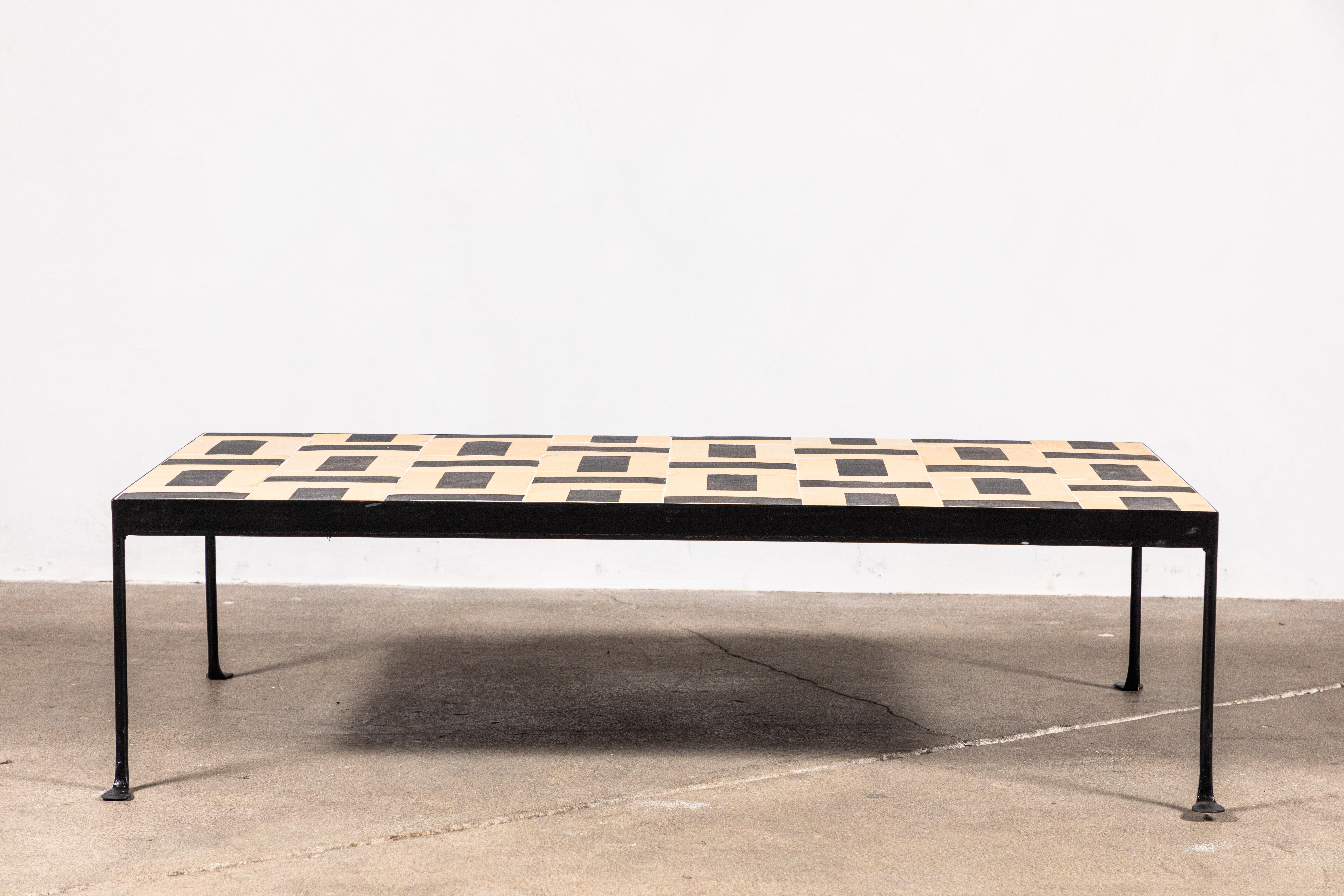 Nickey Kehoe collection outdoor Iron coffee table with one of a kind French black and white cement tiles.