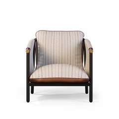 Outdoor Lounge Armchair Featuring Leather Upholstery and Gold Accents