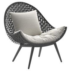 Chaise longue d'extérieur en osier tressé ouvert 