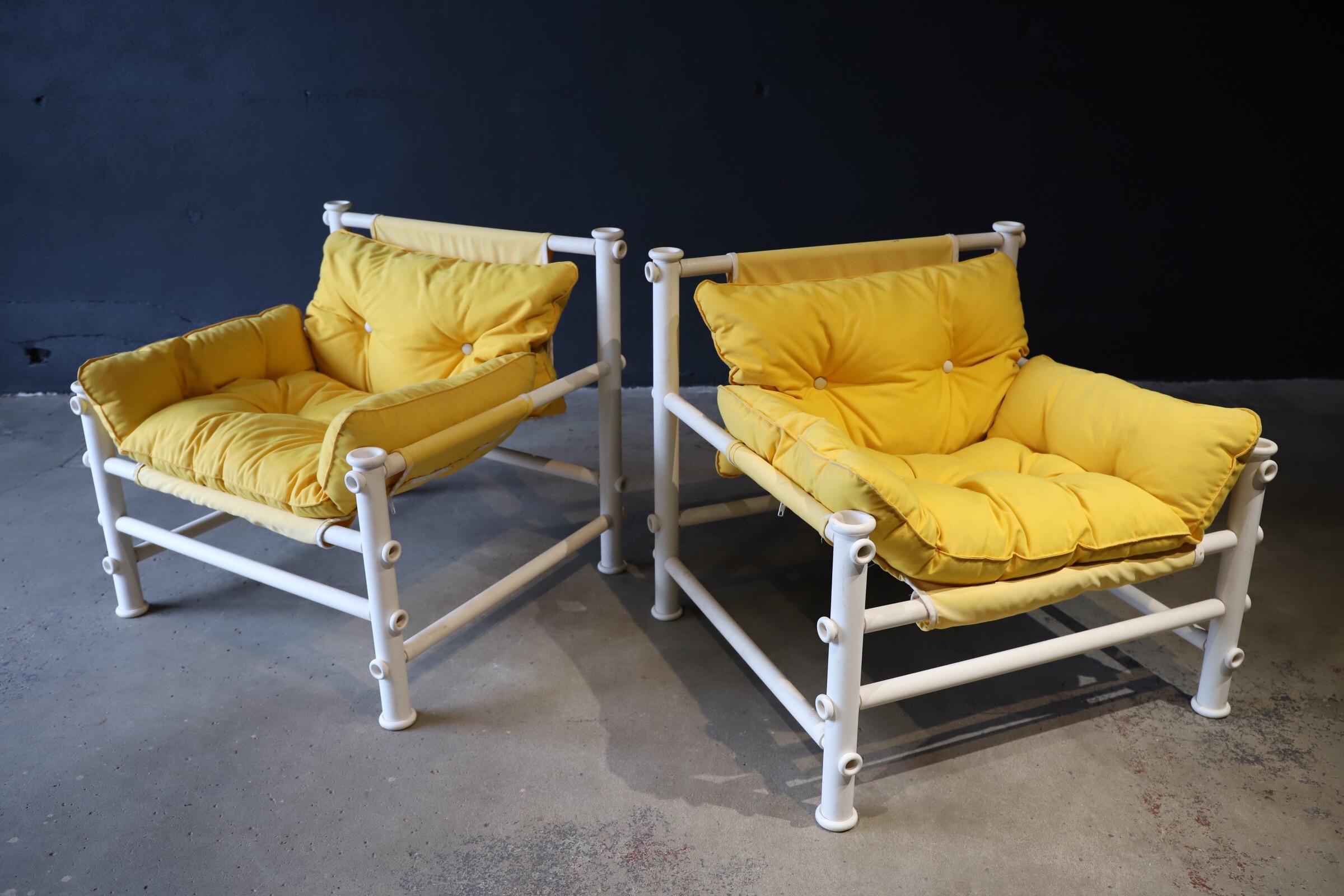 Super fun, bright yellow outdoor lounge chairs designed by Jerry Johnson for Landes Manufacturing Co. Chairs were not produced in massive quantities, so tend to be rarely sold/seen/found. PVC chair frame with detachable padded outdoor Sunbrella