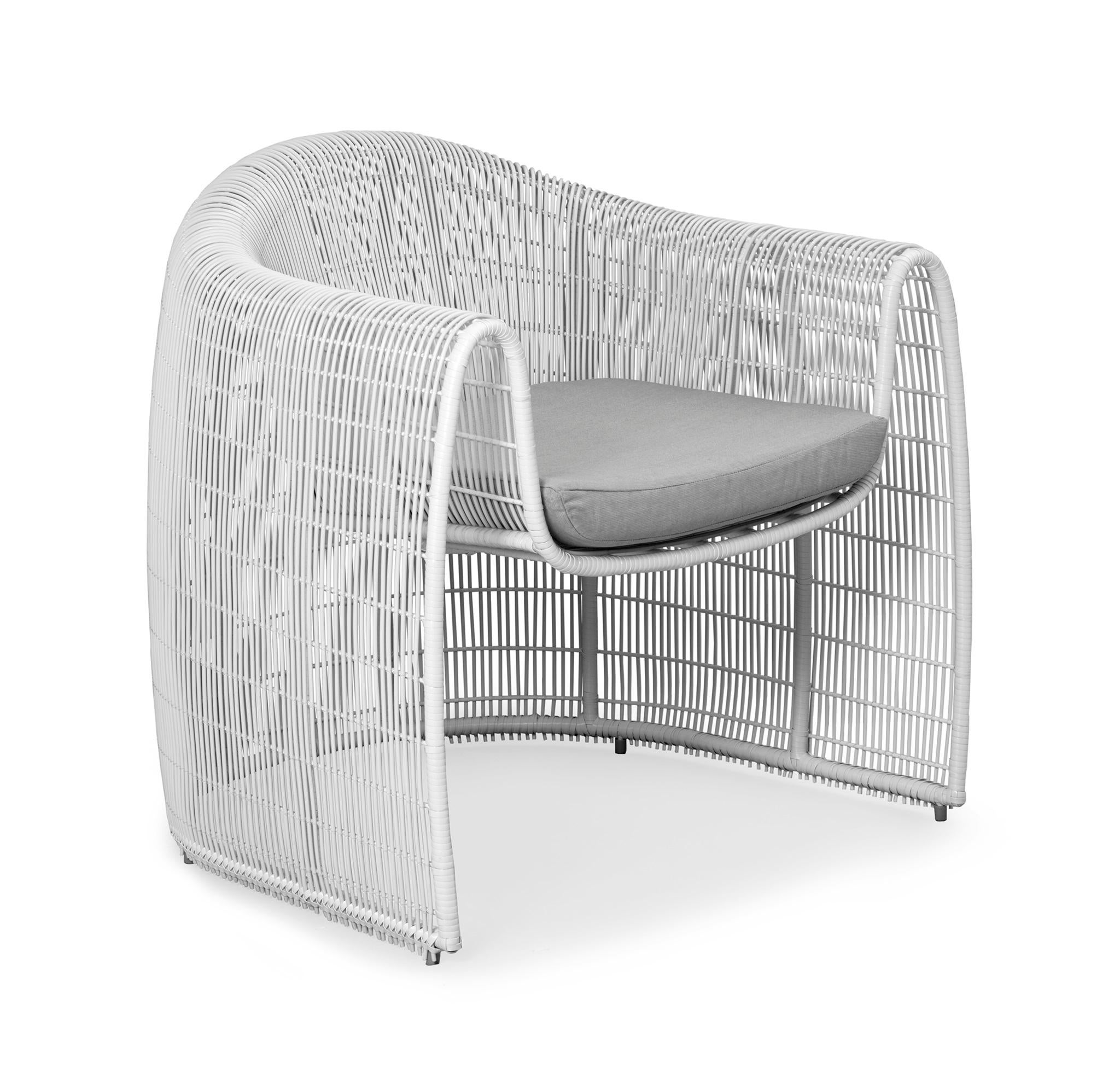 Outdoor Lulu club chair by Kenneth Cobonpue
Materials: polyethelene, steel. 
Also available in other colors and for indoors.
Dimensions: 78 cm x 84 cm x H 80.5 cm

Lulu adds grace to any space with its clean, nest-like silhouette. Its open