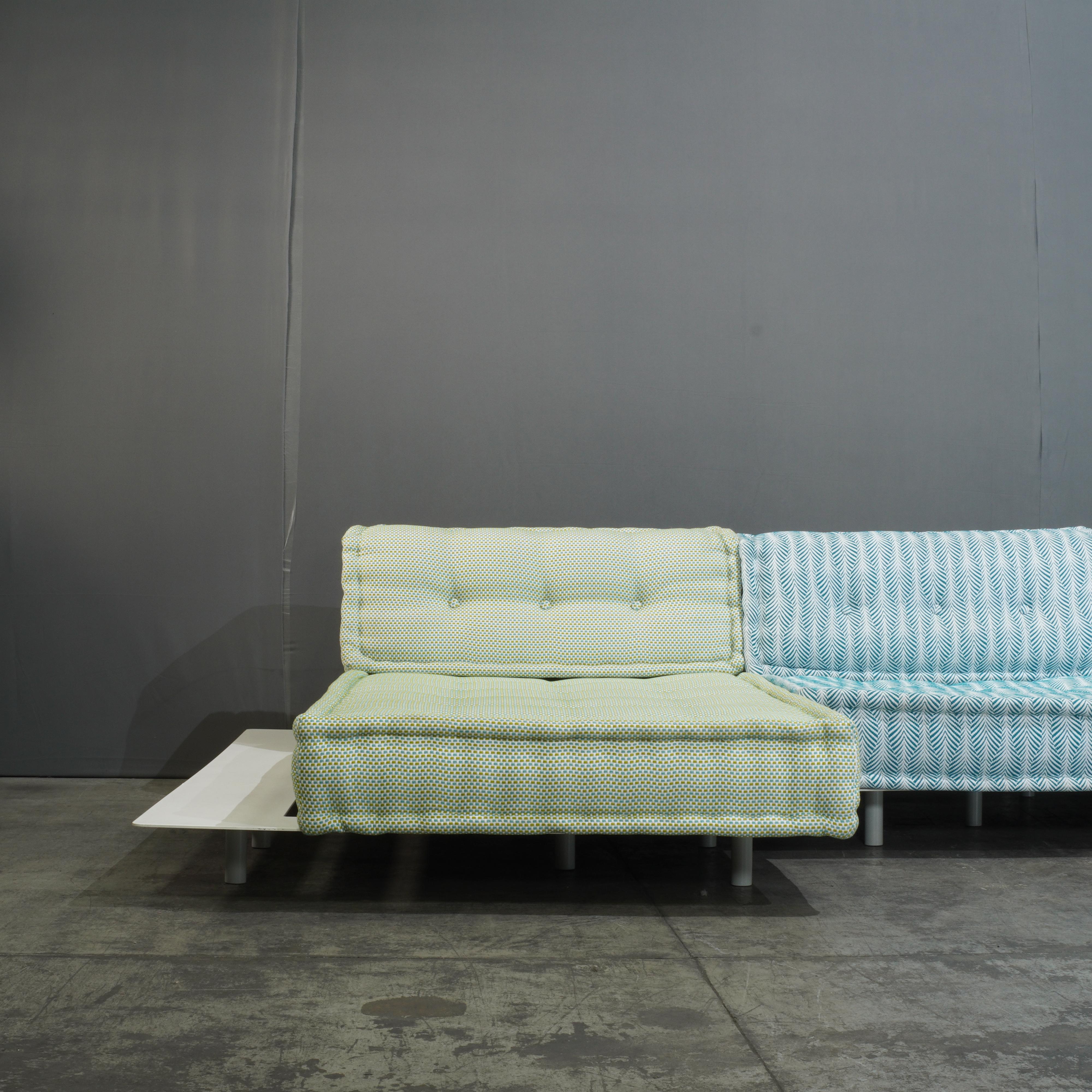 The Outdoor Mah Jong Sectional Sofa by Roche Bobois, upholstered in Missoni fabrics, is a striking, vibrant statement piece perfect for any luxury outdoor setting. This set of seven modular components showcases Roche Bobois' signature playful