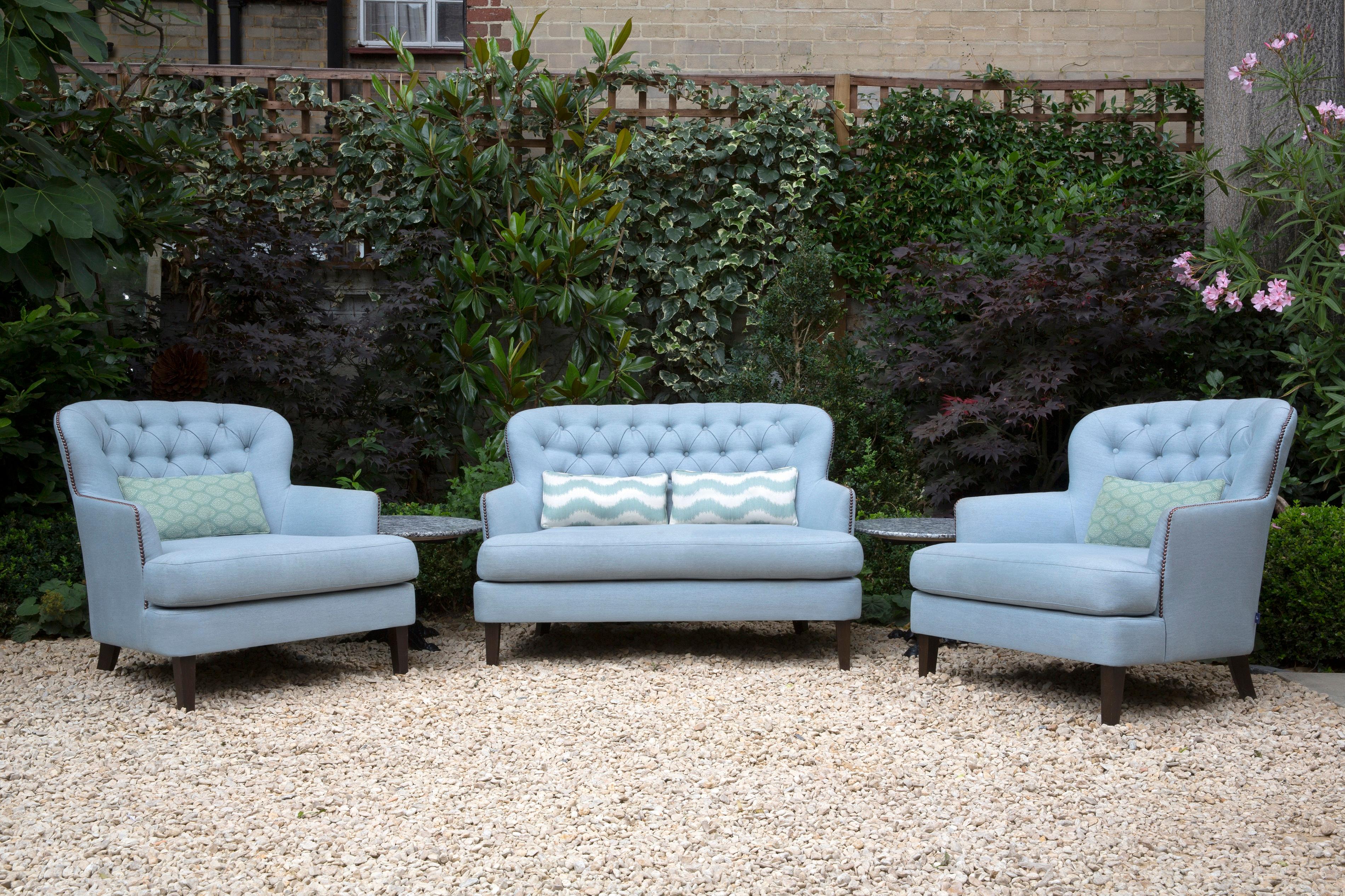 Outdoor Verdons sofa by Coco Wolf.

Internal construction: WPB mortice and tenon joined hard wood frame. Galvanised spring base. Marine grade webbing. All exposed wood is Iroko CUSHIONS: Patented Peltluxé fibre cushion interior and padding to seat