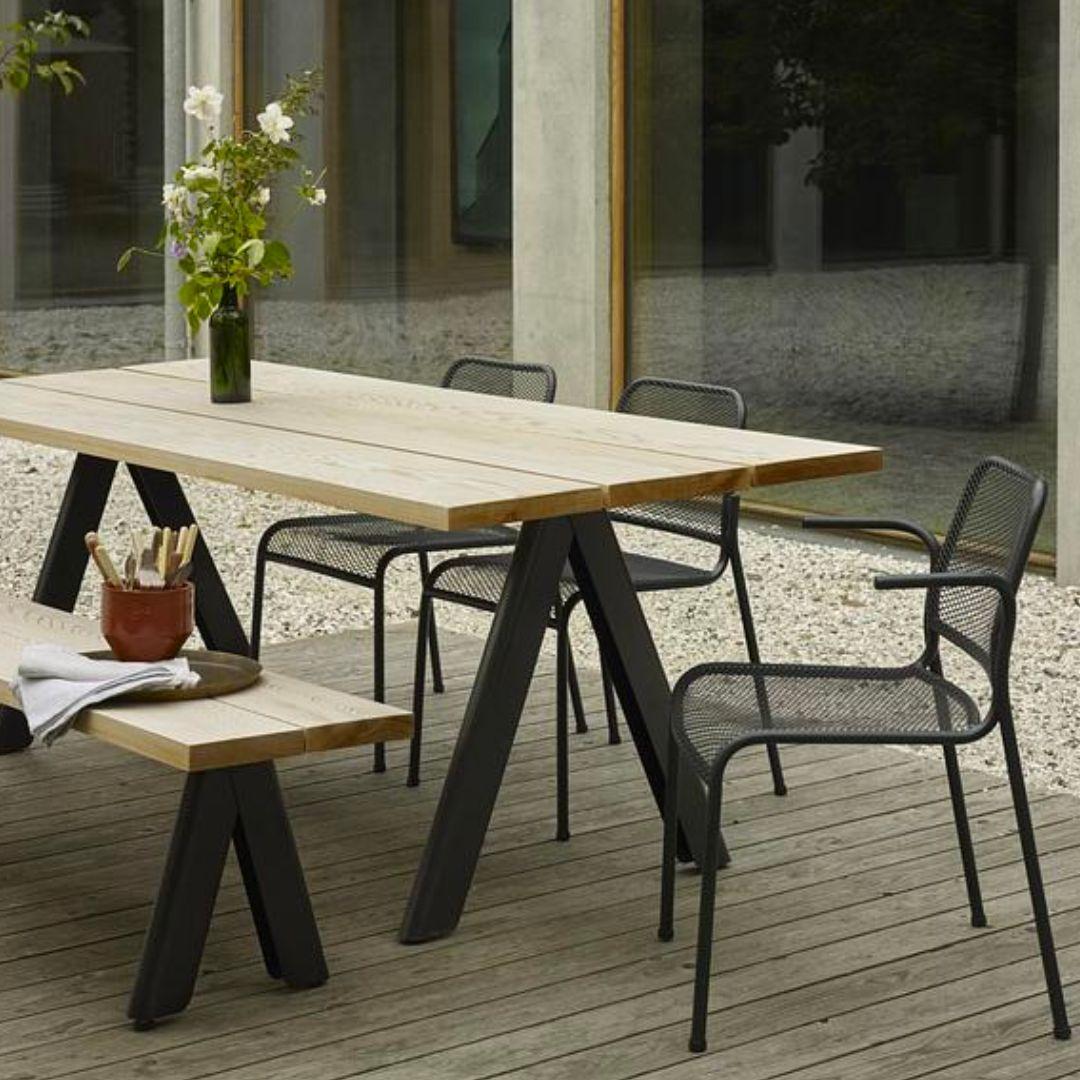 Outdoor 'Overlap' table in western red cedar and black steel for Skagerak

Skagerak was founded in 1976 by Jesper and Vibeke Panduro, who took inspiration from their love of Scandinavian design and its rich tradition. The brand emphasizes