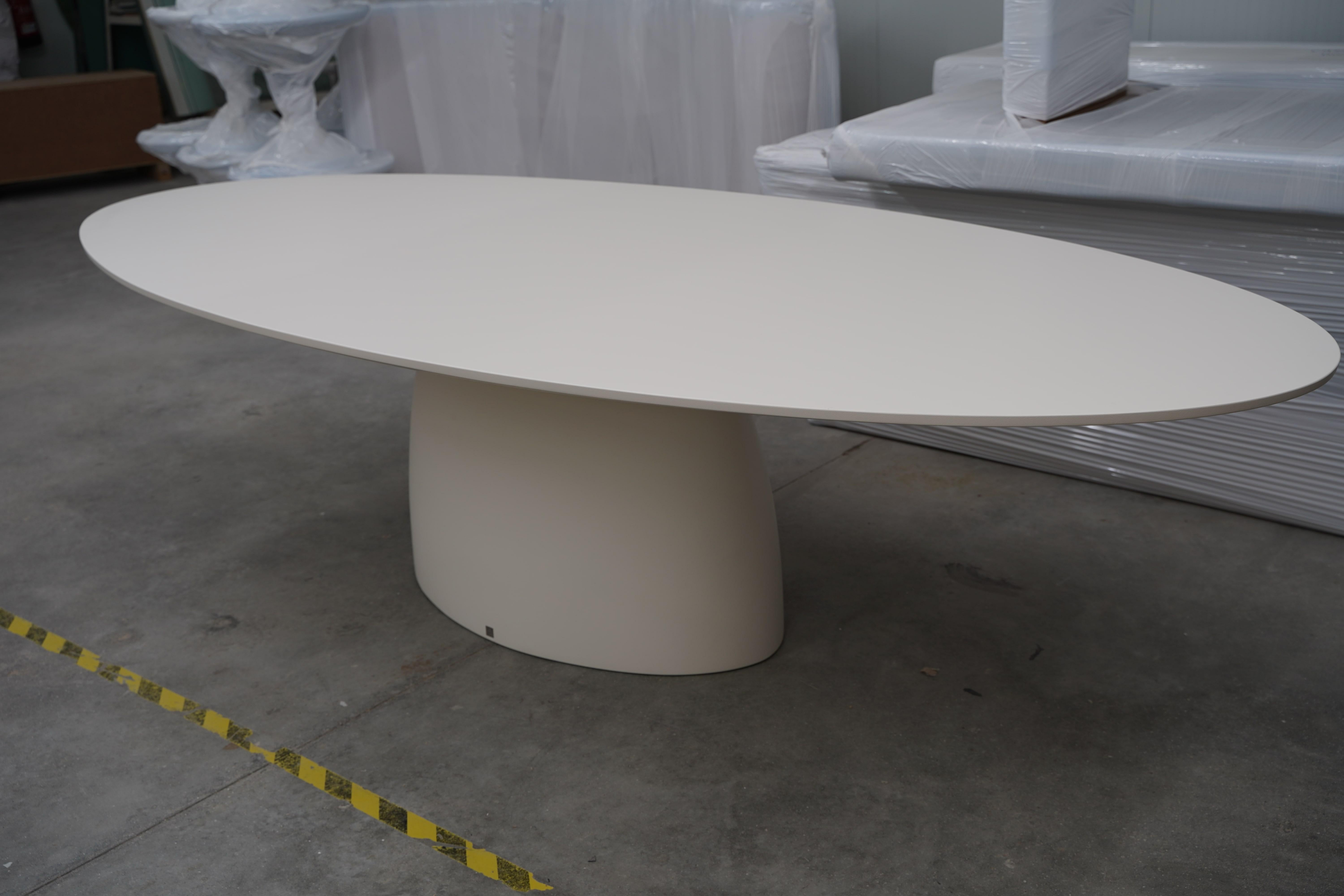 Handcrafted of fiber reinforced resin, a forceful material for extreme weather conditions. 
Lacquered in matte white with protective UV coat.
Dimensions (cm): 300 x 130 x 75
Dimensions (in): 118.1 x 51.2 x 29.5
Seat 8 to 10.
This piece is offered in