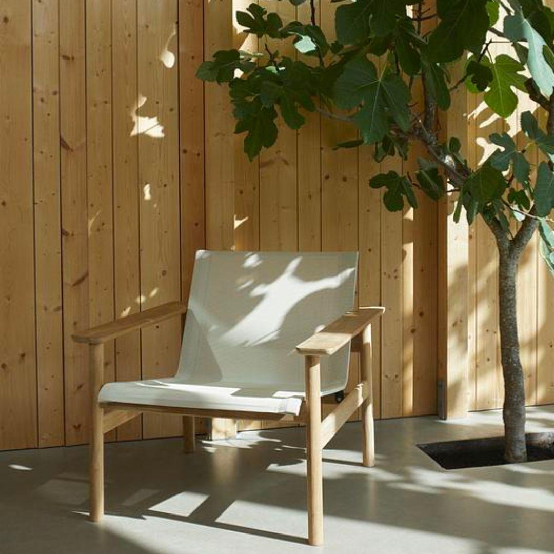 Outdoor 'Pelagus' lounge chair in teak and fabric for Skagerak

Skagerak was founded in 1976 by Jesper and Vibeke Panduro, who took inspiration from their love of Scandinavian design and its rich tradition. The brand emphasizes sustainability by