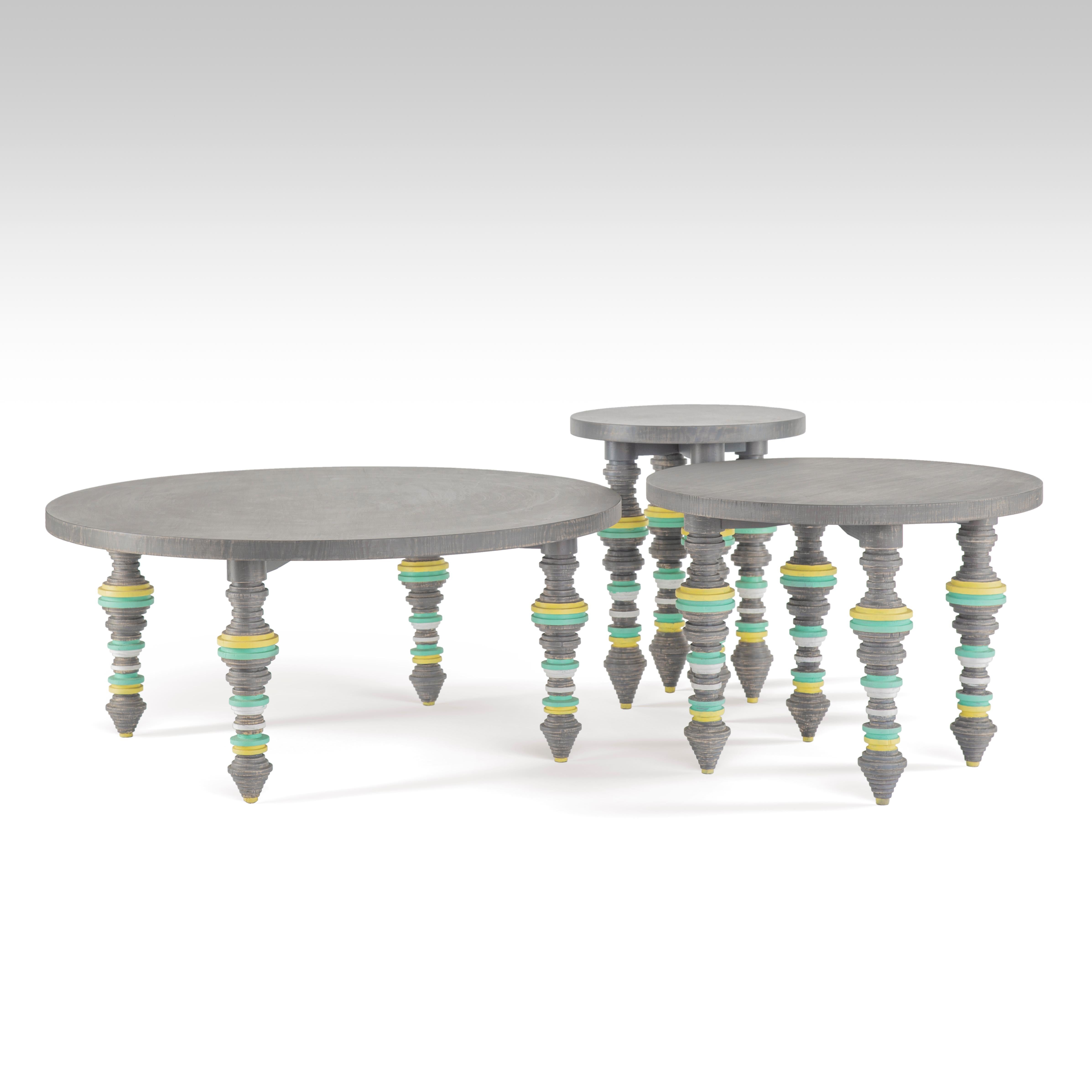 Outdoor pitch pine wood coffee table set of 3, with carved and colored legs.
Not your traditional Egyptian tableya! We just gave the homegrown Egyptian table a fun makeover. Our Tableya Trio legs are crafted from Pitch Pine with a