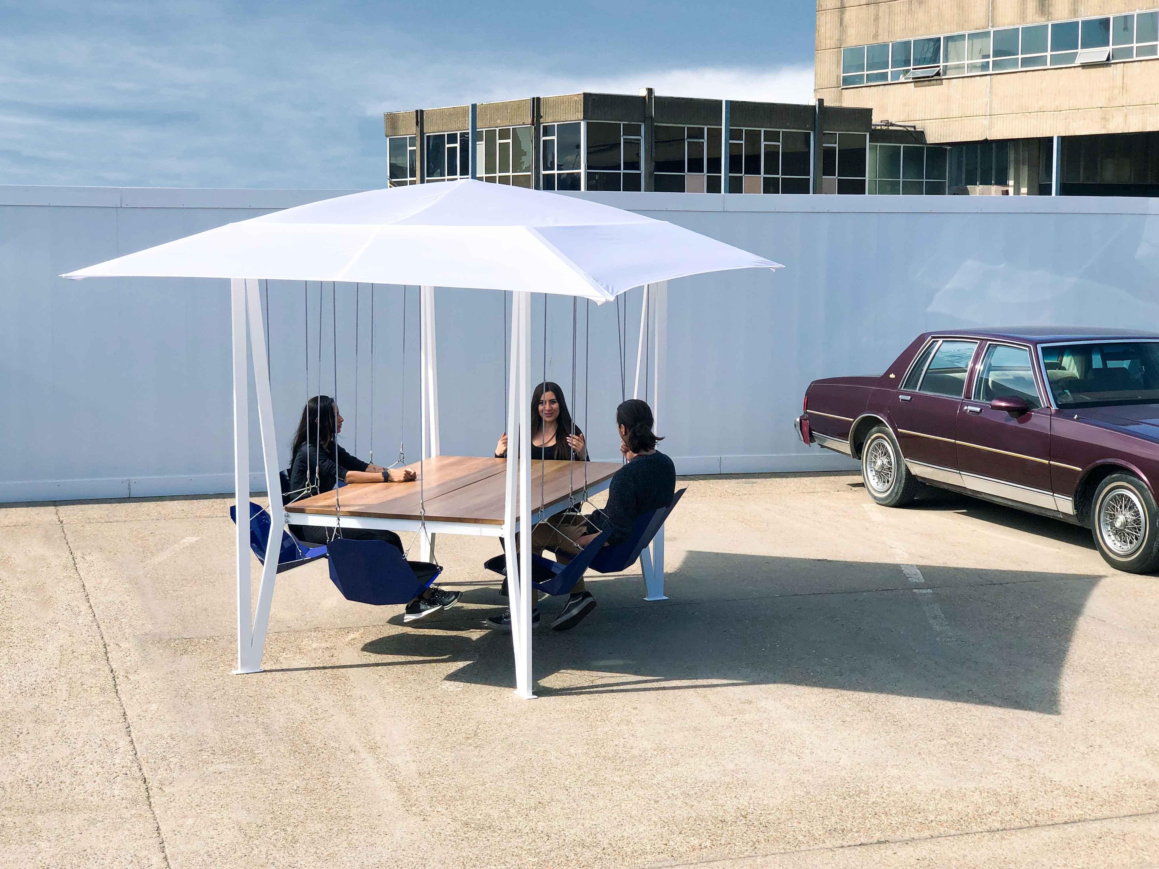 The Swing Table is an original design from British designer Christopher Duffy and Design Studio Duffy London.  An engaging furniture piece for the home, office interior, and even outdoors.

Bring the playground into the boardroom, dining room, or