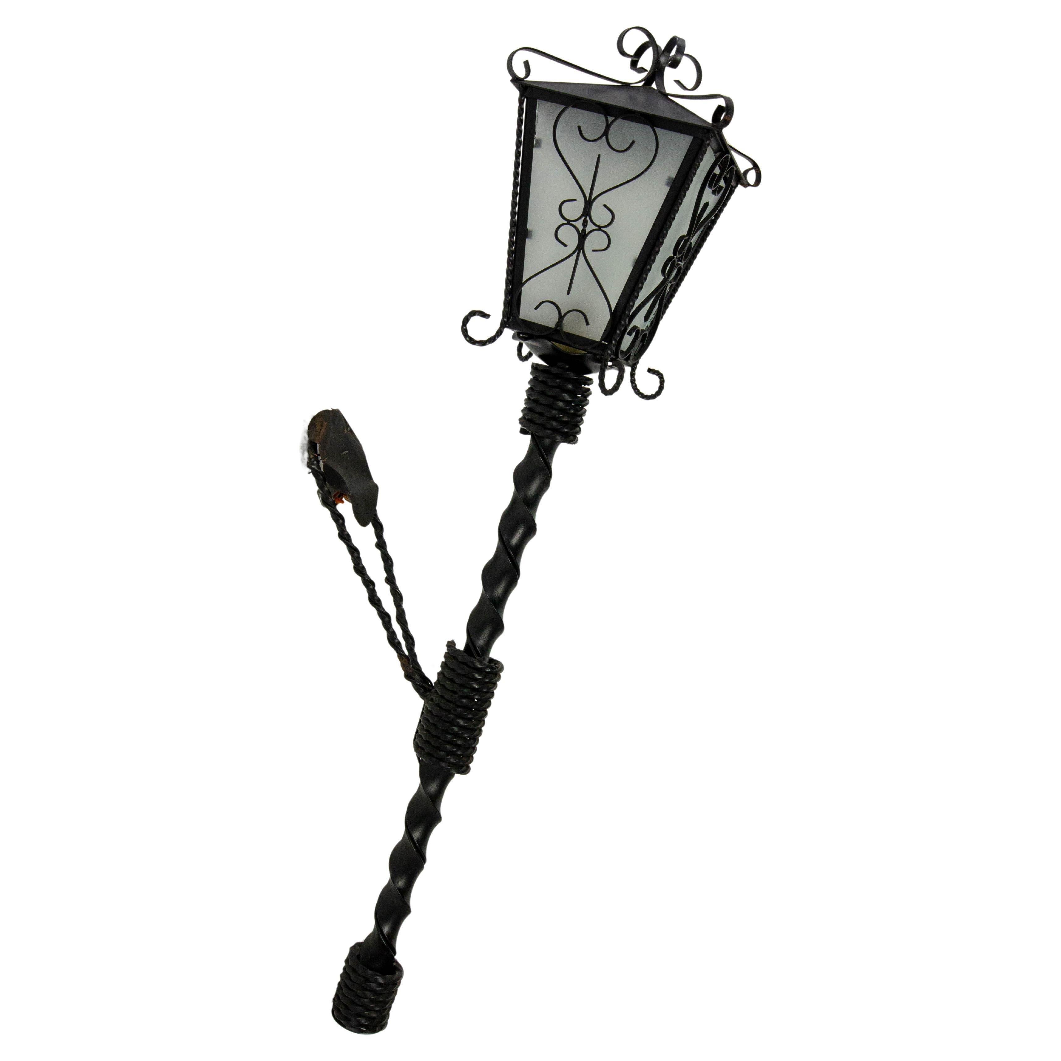 French outdoor light lantern of exterior wall sconce, iron and glass.
This wall light will also be appreciated by the halo it projects on its support.
Good condition with few marks of use.

Shipping: 
97/36/24 cm 3Kg.