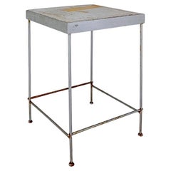 Outdoor side table with fish stone slab top