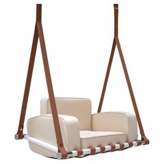 Sedia a dondolo per esterni con rivestimento impermeabile beige e cinghie in pelle marrone