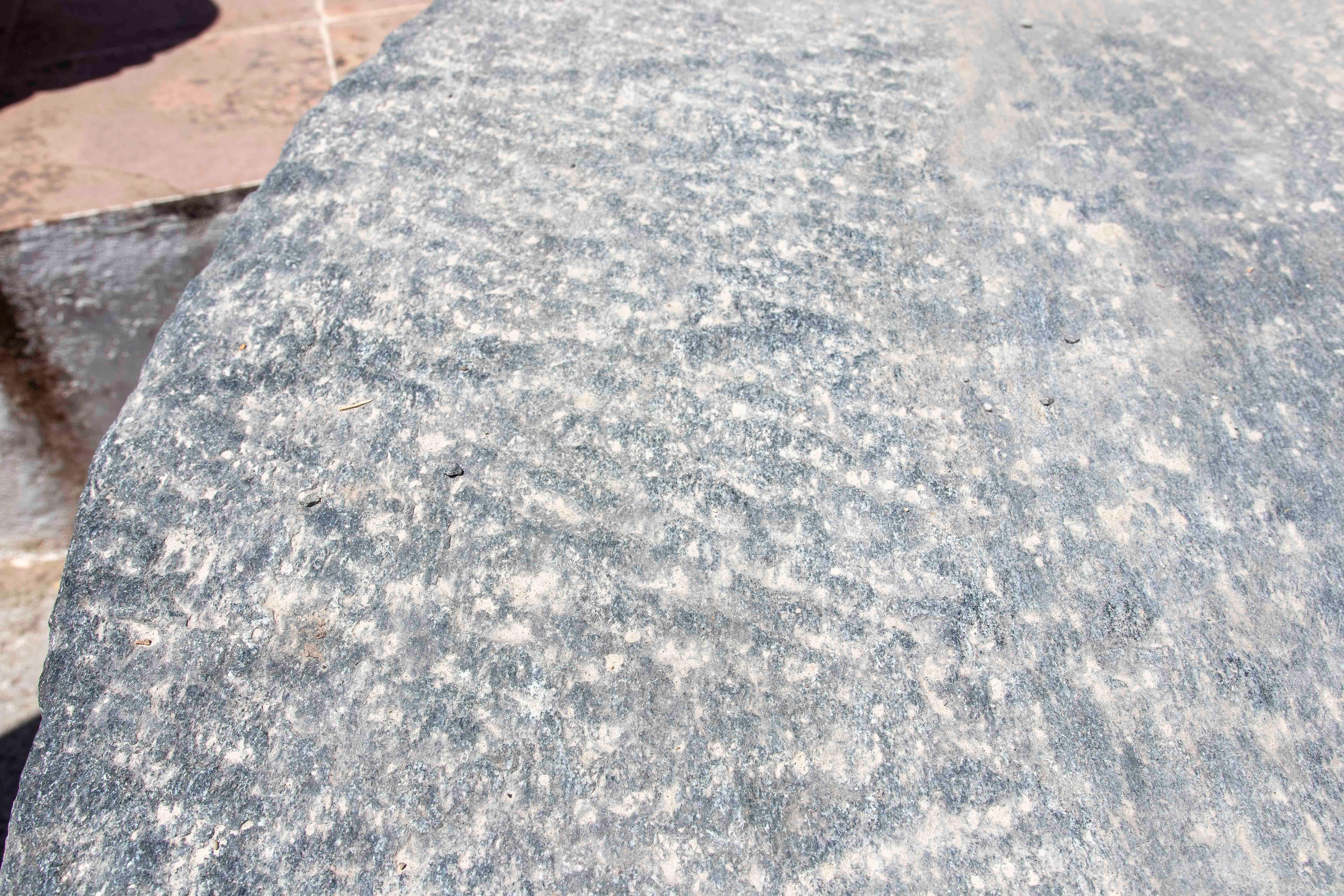 Outdoor Table with Antique Millstone and Cylindrical Base Made of Natural Stone For Sale 4