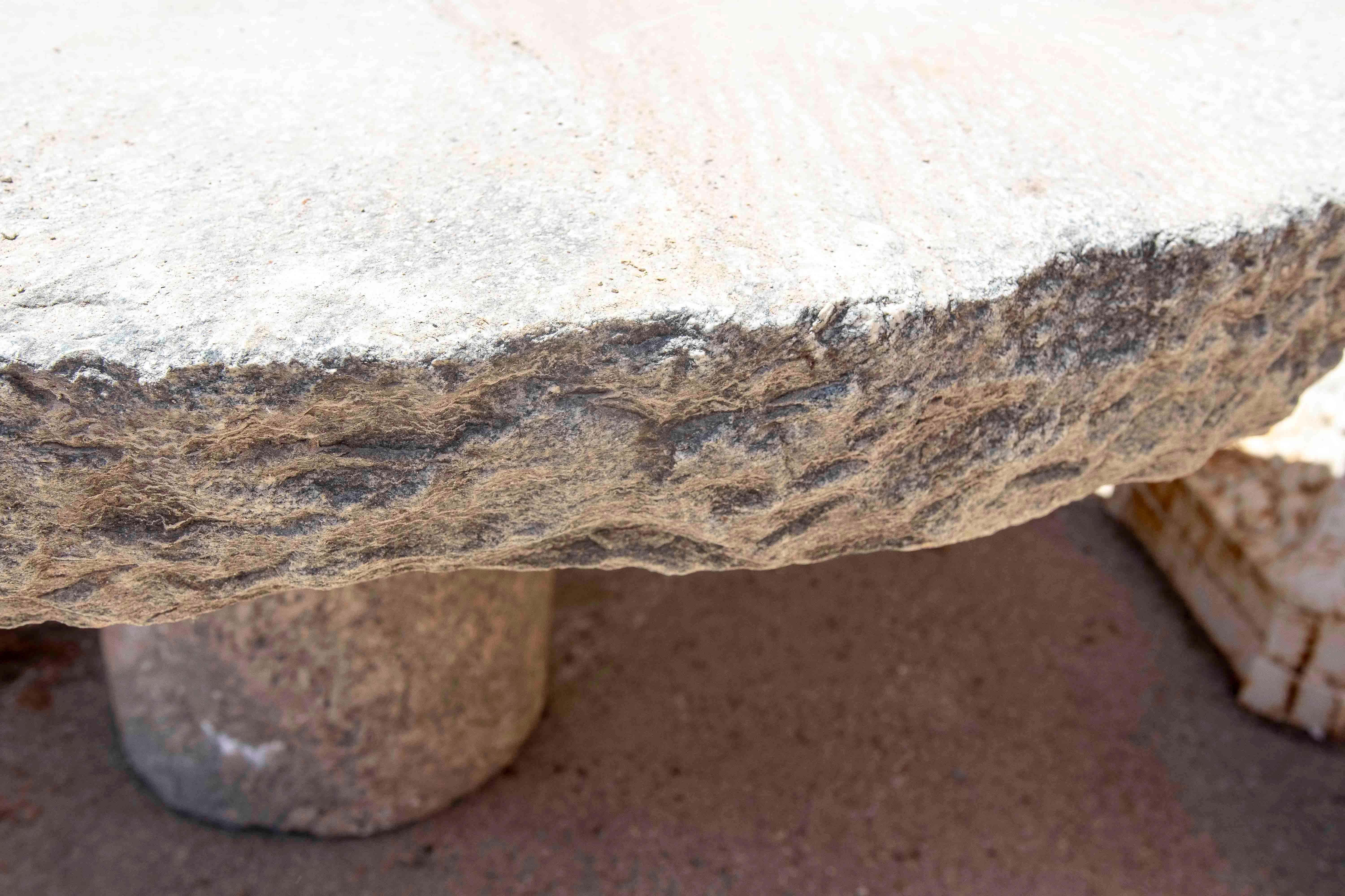 Outdoor Table with Antique Millstone and Cylindrical Base Made of Natural Stone For Sale 5