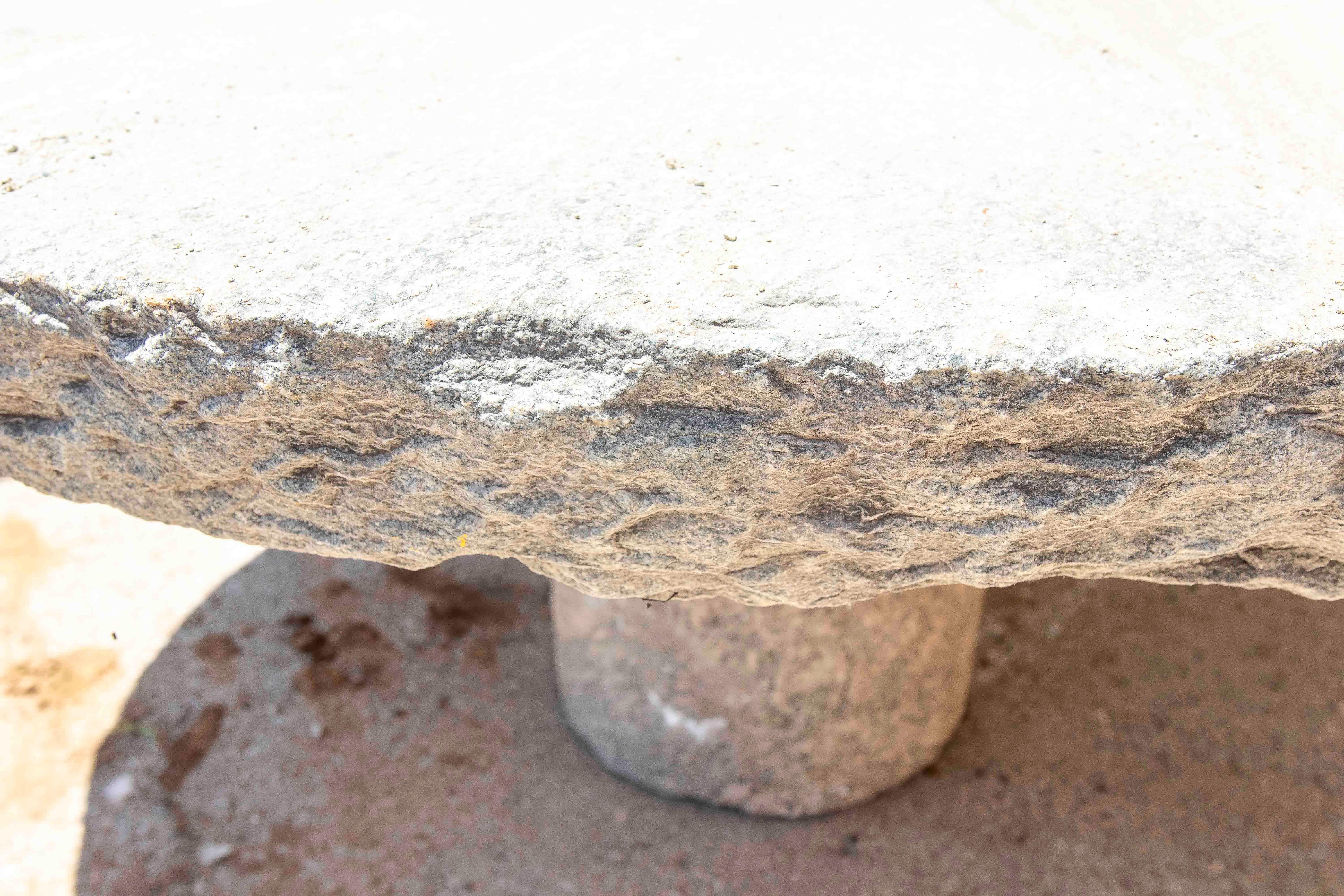 Outdoor Table with Antique Millstone and Cylindrical Base Made of Natural Stone For Sale 6
