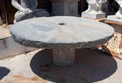 Outdoor Table with Antique Millstone and Cylindrical Base Made of Natural Stone