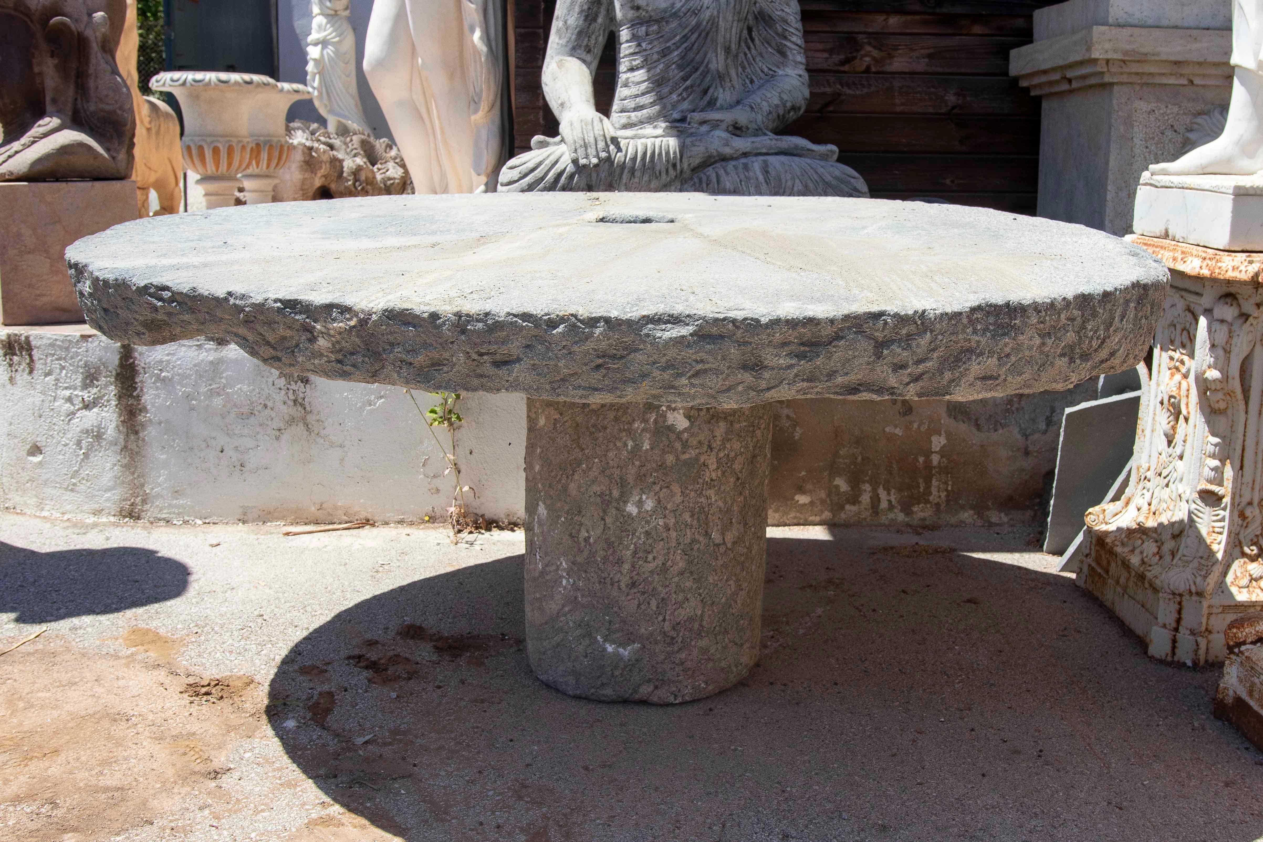 Outdoor Table with Antique Millstone and Cylindrical Base Made of Natural Stone In Good Condition For Sale In Marbella, ES