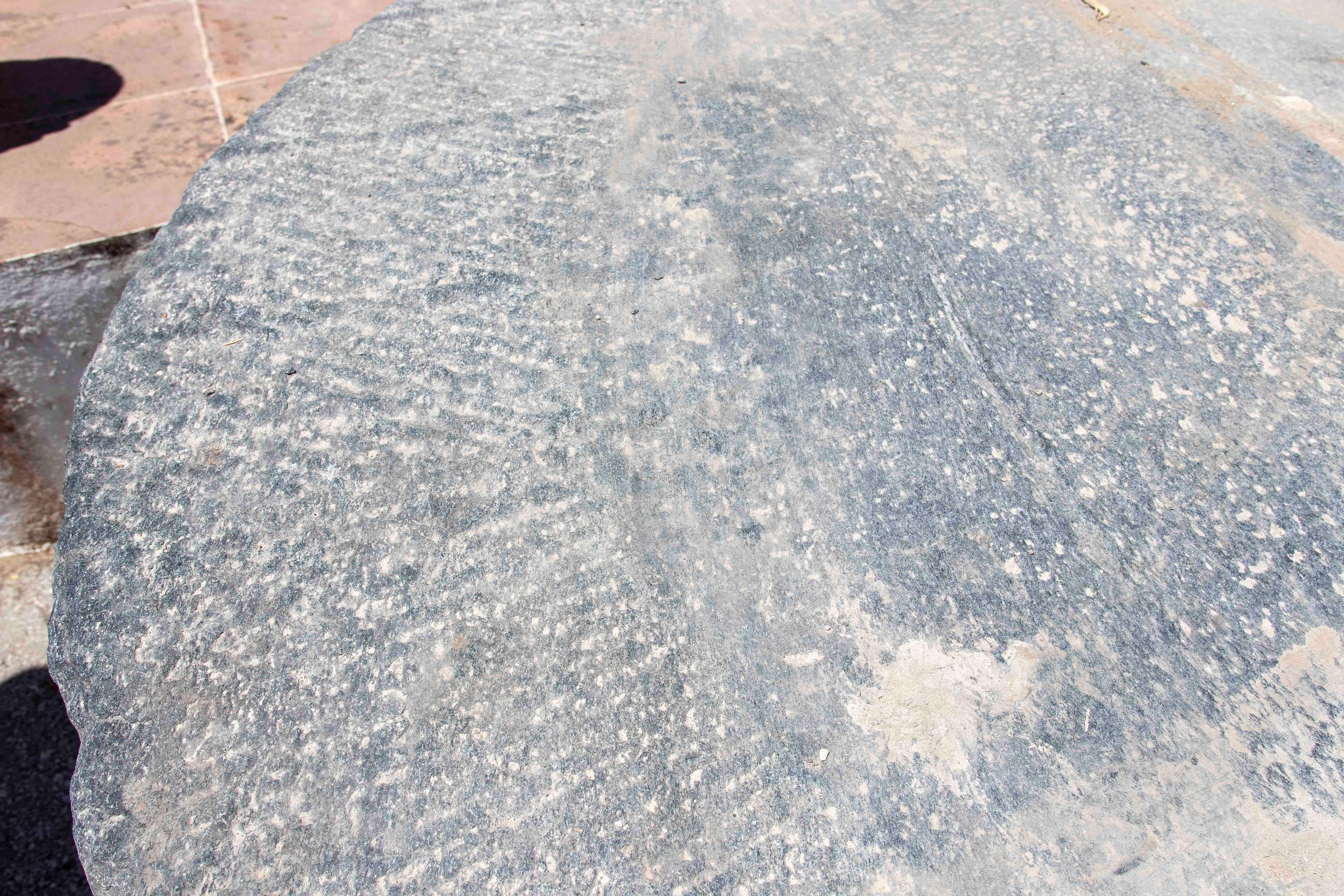 Outdoor Table with Antique Millstone and Cylindrical Base Made of Natural Stone For Sale 3