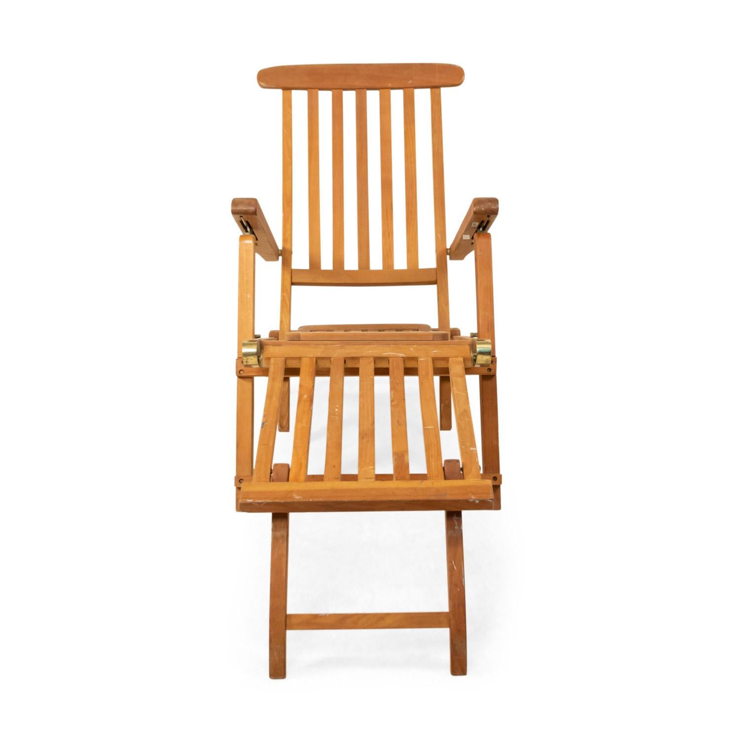 Outdoor (20th Cent) teak folding deck chairs with slat design and brass trim