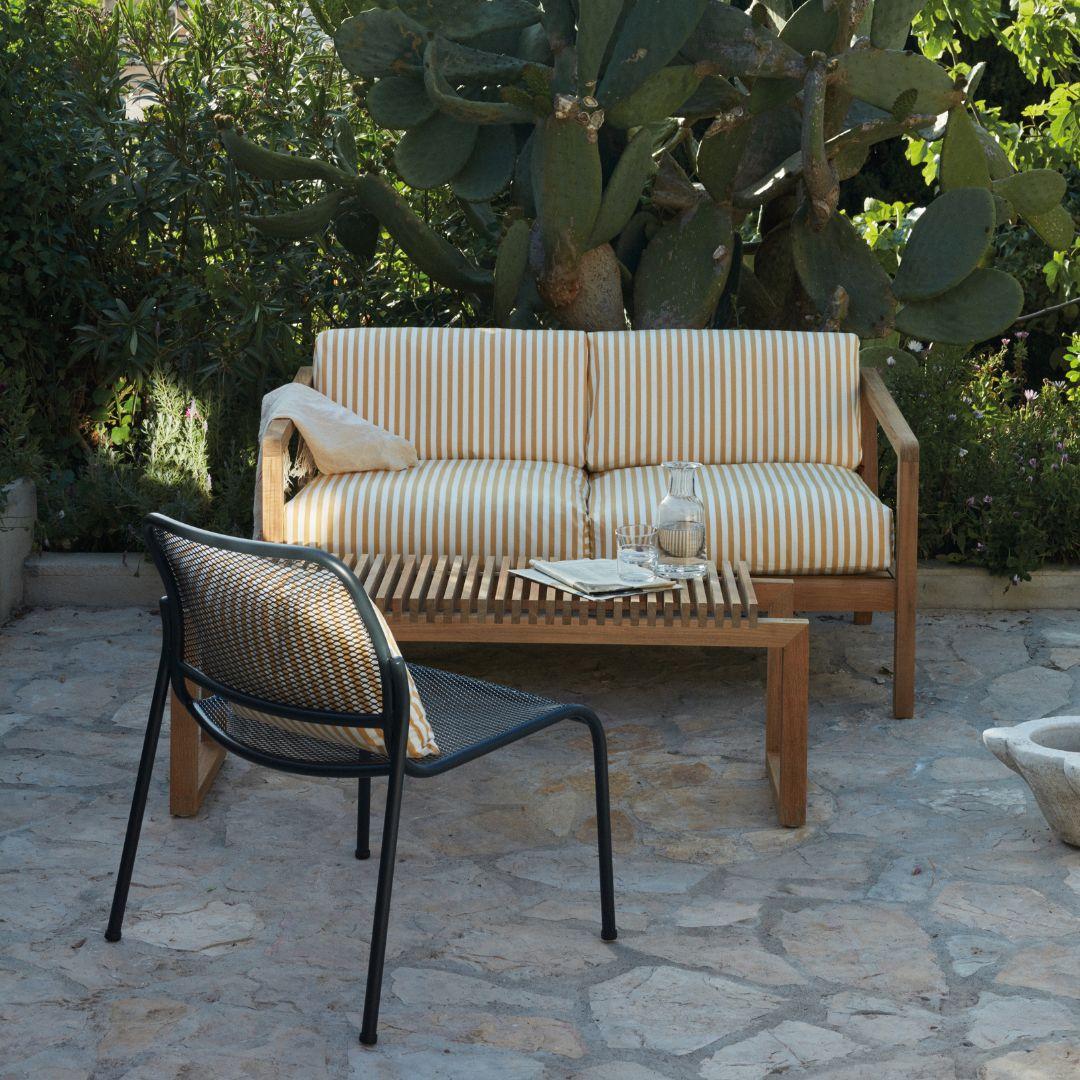 Outdoor 'Virkelyst' 2-seater sofa in teak and yellow striped fabric for Skagerak

Skagerak was founded in 1976 by Jesper and Vibeke Panduro, who took inspiration from their love of Scandinavian design and its rich tradition. The brand emphasizes