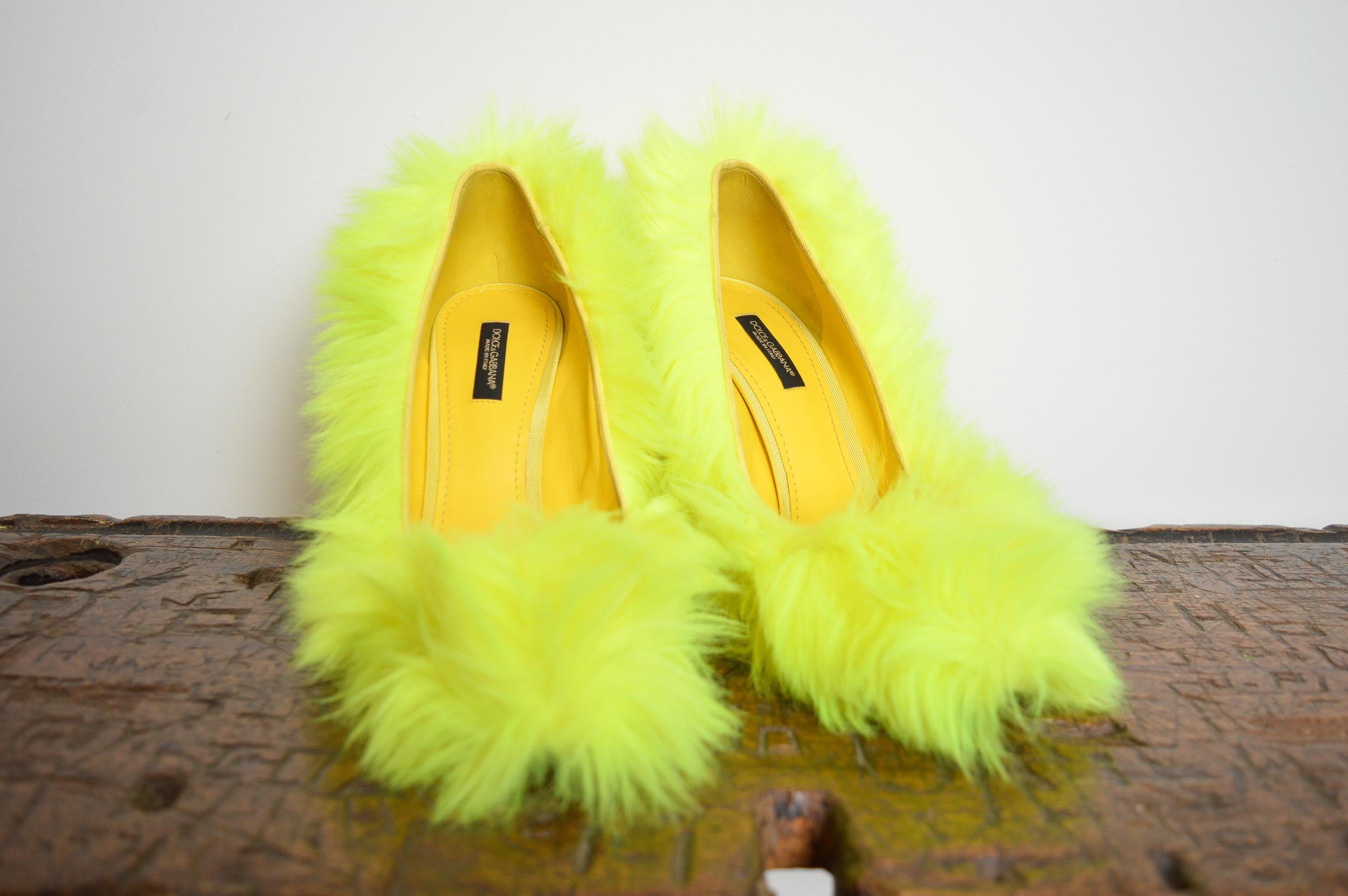Outrageous DOLCE & GABBANA Neon Yellow 'fluorescent faux fur' stiletto high heels  !
Made in Italy. 
Leather Soles
Leather lined interior.
U.K. Size 6.5 / EU Size 40
Heel height : 4.5” inches
Condition; 9.5/10 the Shoes were used for a high fashion