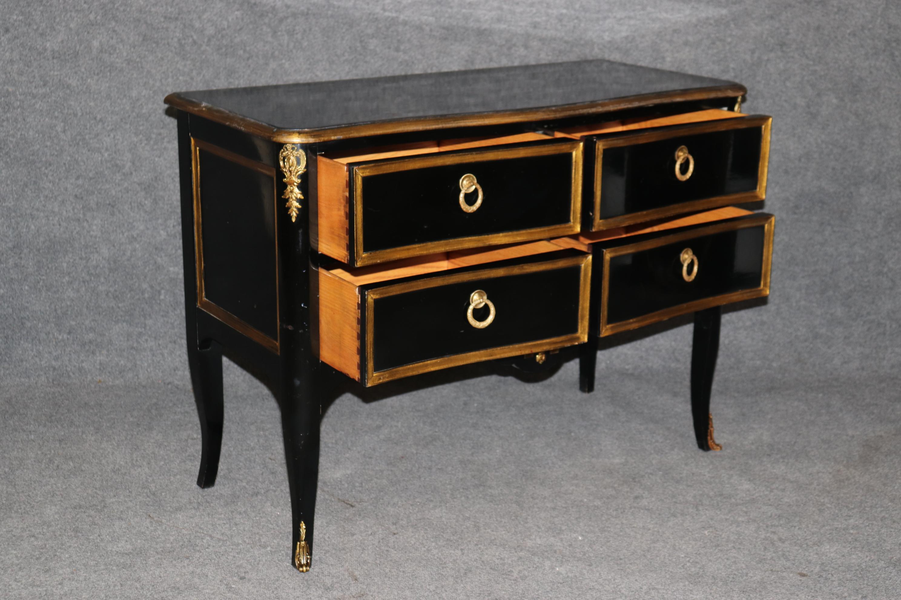 This is a superb Jaqcues Bodart 4 drawer commode. The commode is in very good condition with minor signs of wear and use as can be seen but is very minimal. The bronze is crisp and of the finest quality and the gold leaf adds a luminosity to the