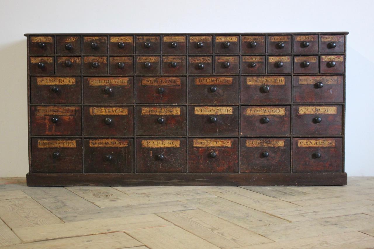 19th Century Outstanding and Large English Bank of Chemist Drawers in Original Condition For Sale