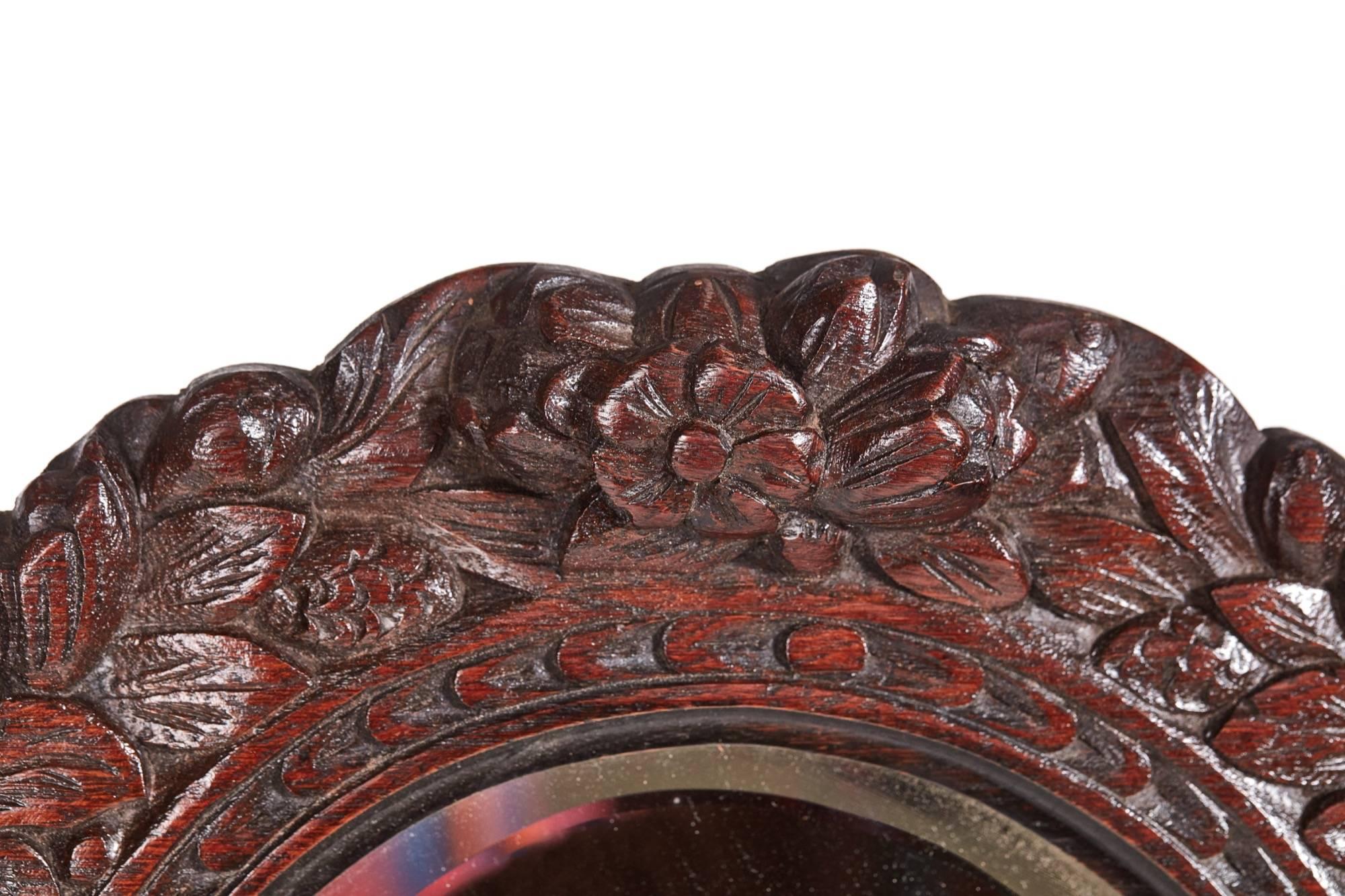 Outstanding antique carved oak wall mirror having a fantastic carved frame decorated with floral motifs, fruit and acorns
Fantastic color and condition.