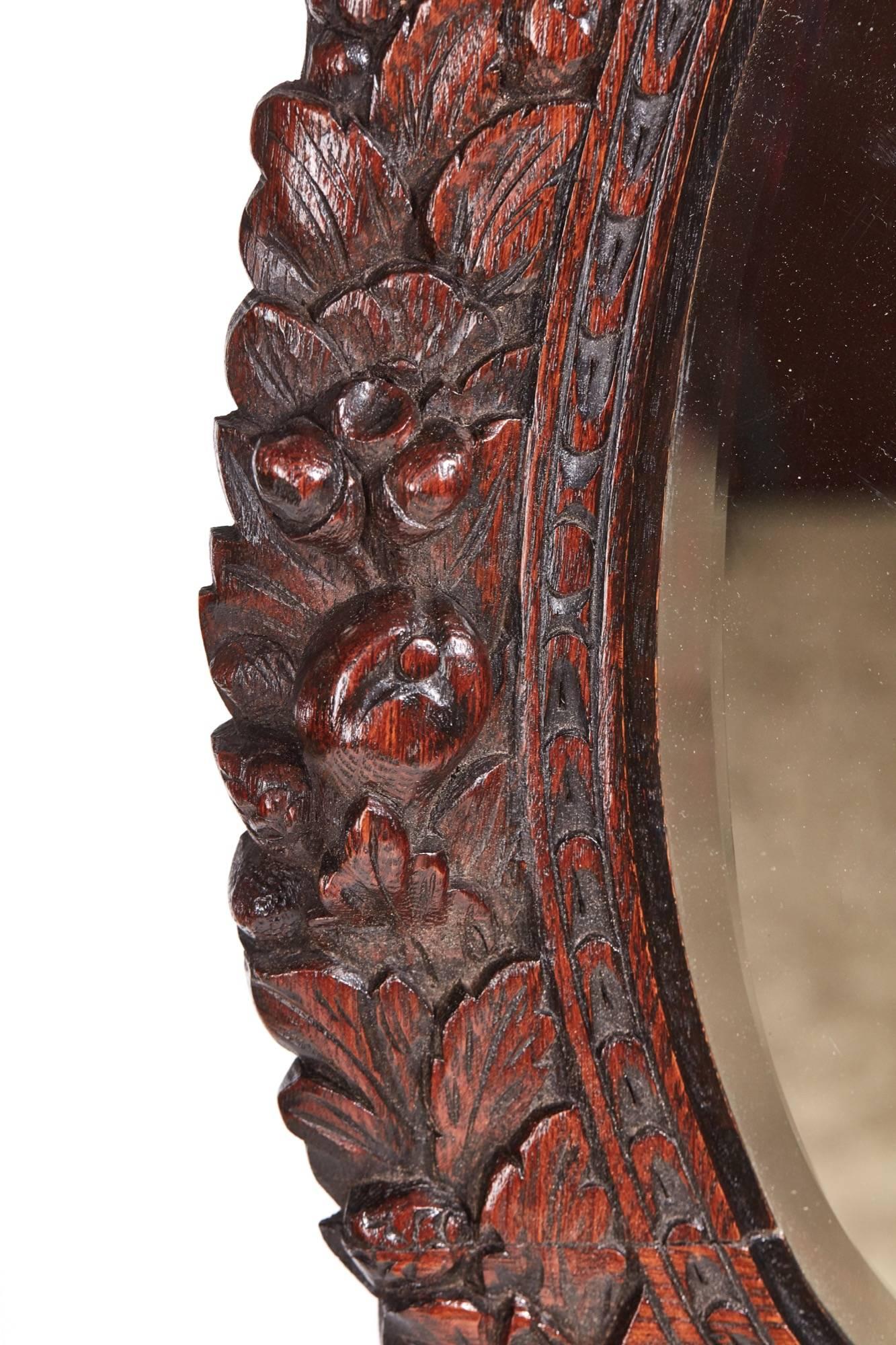 antique oval oak mirror