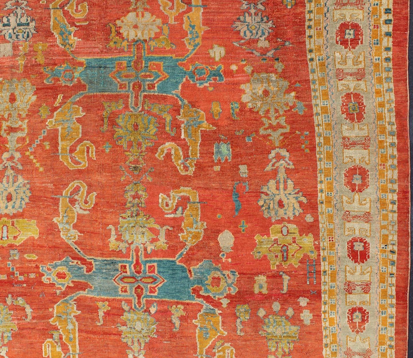 Hand-Knotted 19th Century Oushak with Tribal Design in Orange Red, Blue, L. Green, Ice Blue For Sale