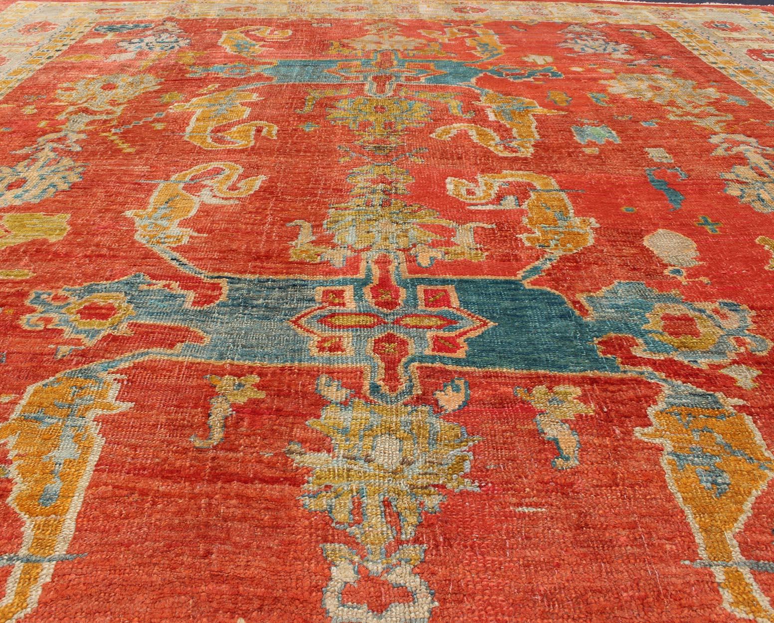 Late 19th Century 19th Century Oushak with Tribal Design in Orange Red, Blue, L. Green, Ice Blue For Sale