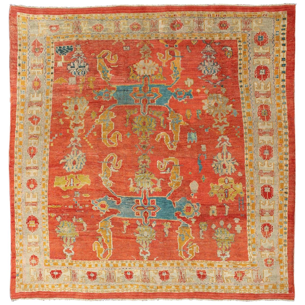 19th Century Oushak with Tribal Design in Orange Red, Blue, L. Green, Ice Blue For Sale