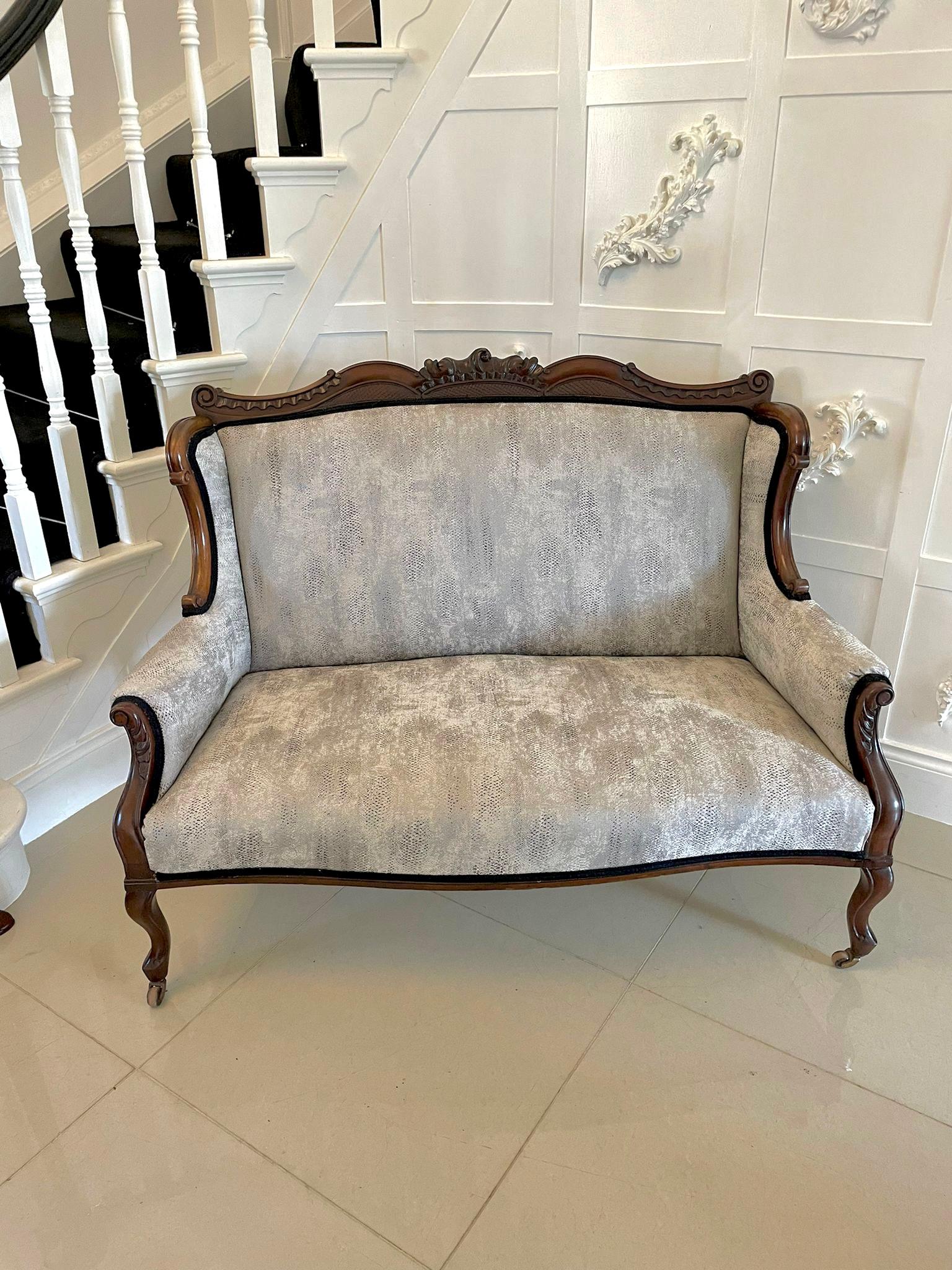 Outstanding antique Victorian carved mahogany sofa with a beautifully expertly carved shaped back framed in mahogany which comes forward to a lovely carved shaped arms. It stands on attractively shaped cabriole legs to the front and out swept back