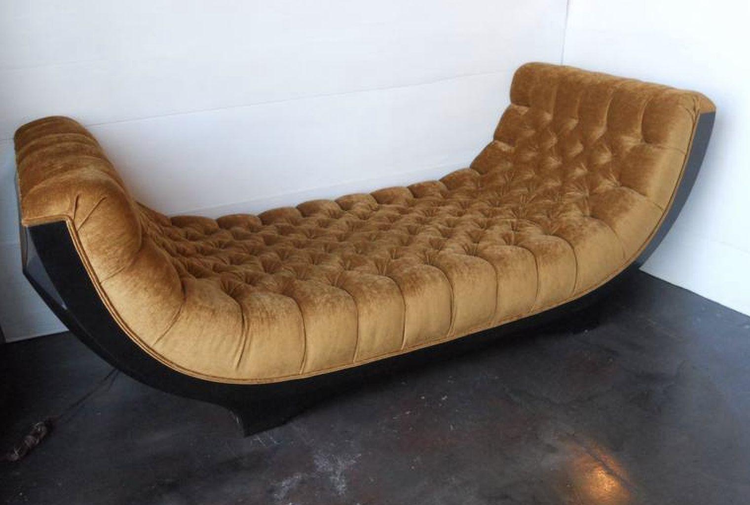 An outstanding Art Deco chaise lounge from the 1960's. Newly upholstered in a tufted brown chenille. Wood is an amazing Macassar ebony with beautiful detail.