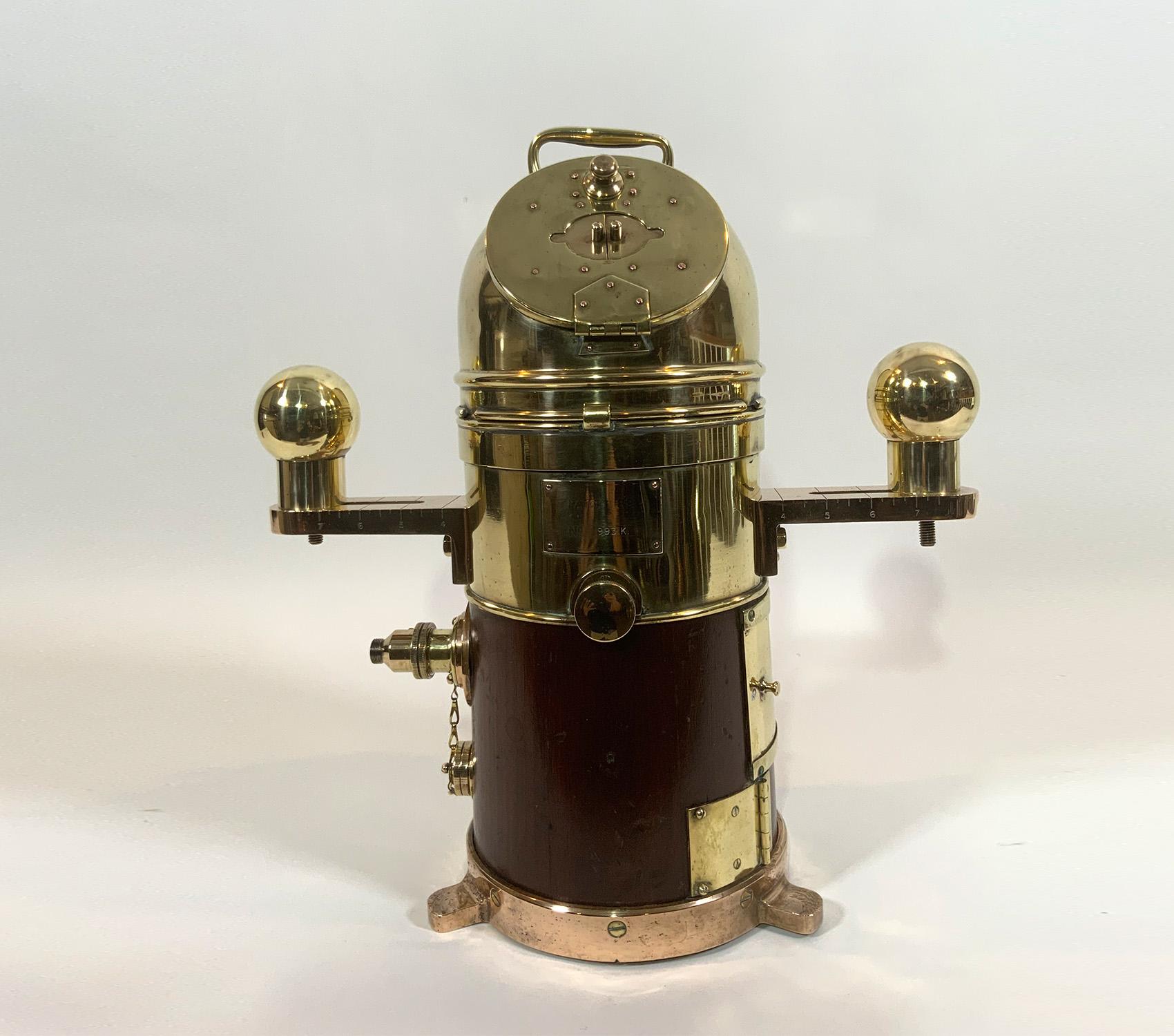 Extremely rare “Faithfull Freddie” ships binnacle in fabulous condition. Meticulously polished and with gimballed compass, countless brass fittings. Rarely found brass compensating ball covers, heavy brass base with mounting flanges. As good as they
