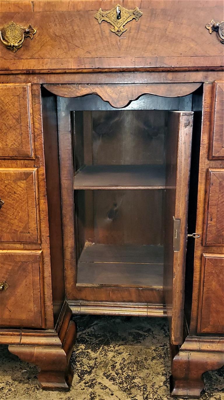 Presenting a stunningly gorgeous and outstanding early 18th century English George I Secretary.

This is one of the finest old English Secretary’s we have ever had!

Made circa 1720 in England and made from the finest burl walnut and flamed