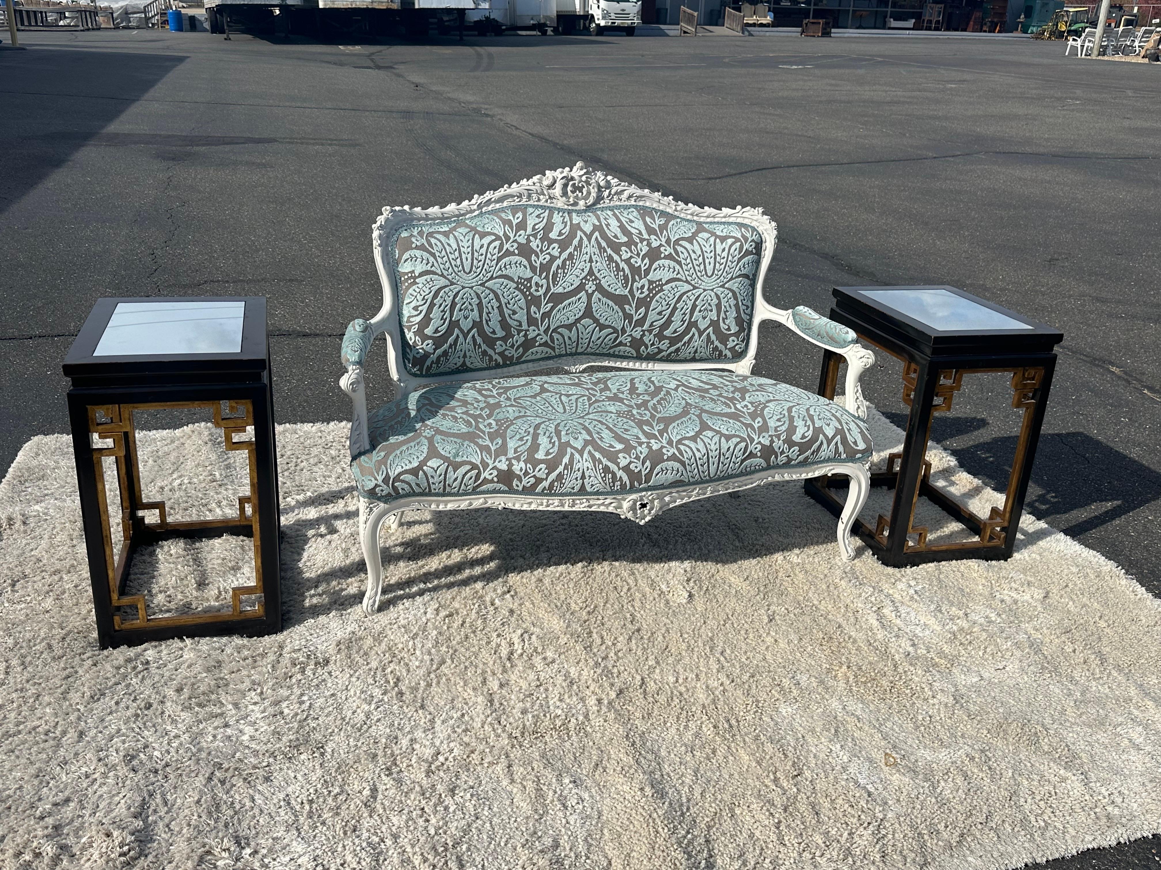 This is an eye-popping color combination of aqua blue velvet on gray Thibaut damask over a fantastic carved robust French frame. The frame has been newly painted in an off-white that really enhances the crisp and intensely carved frame. The frame is